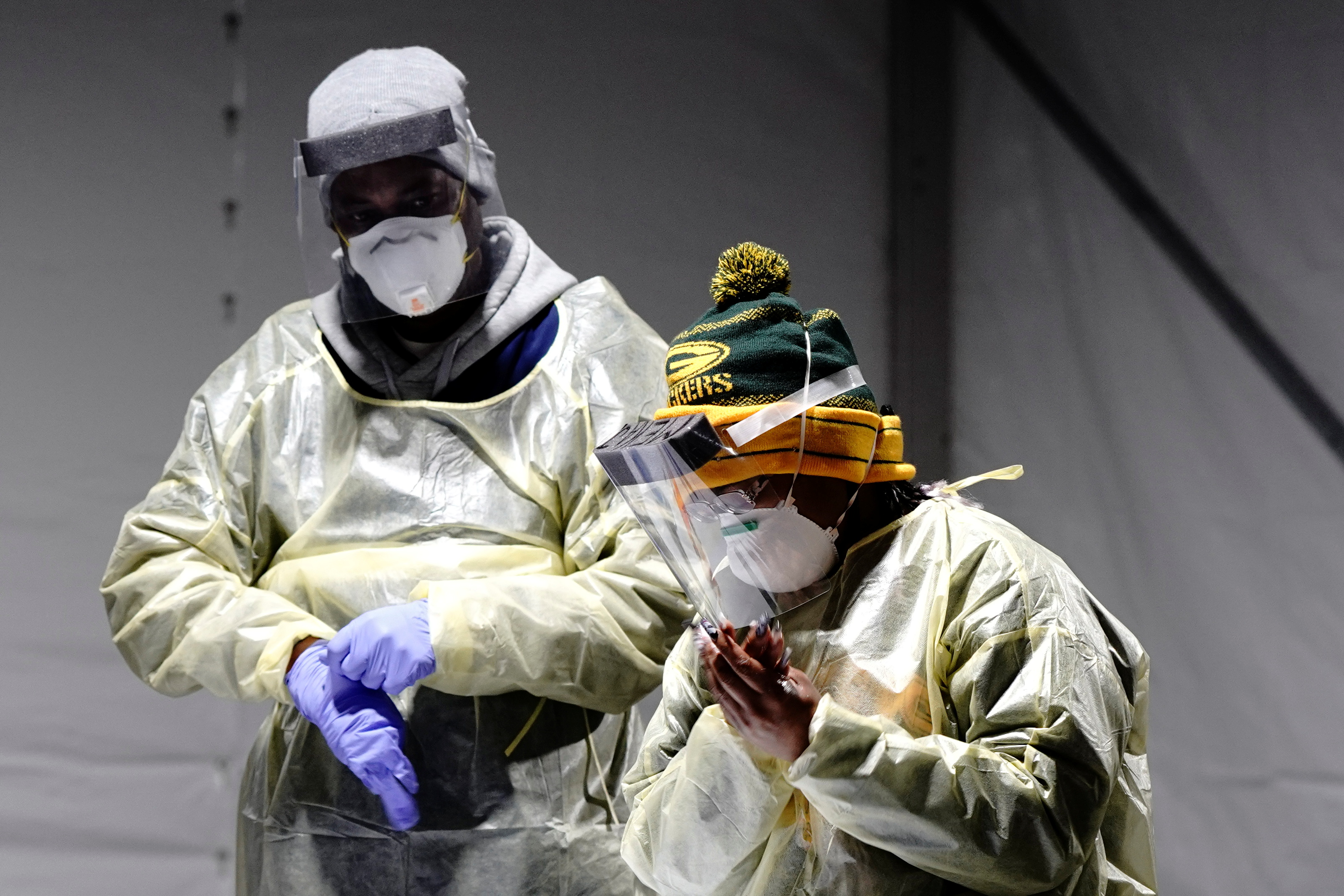 The pandemic has already stretched the country’s healthcare system [Bing Guan/Reuters]