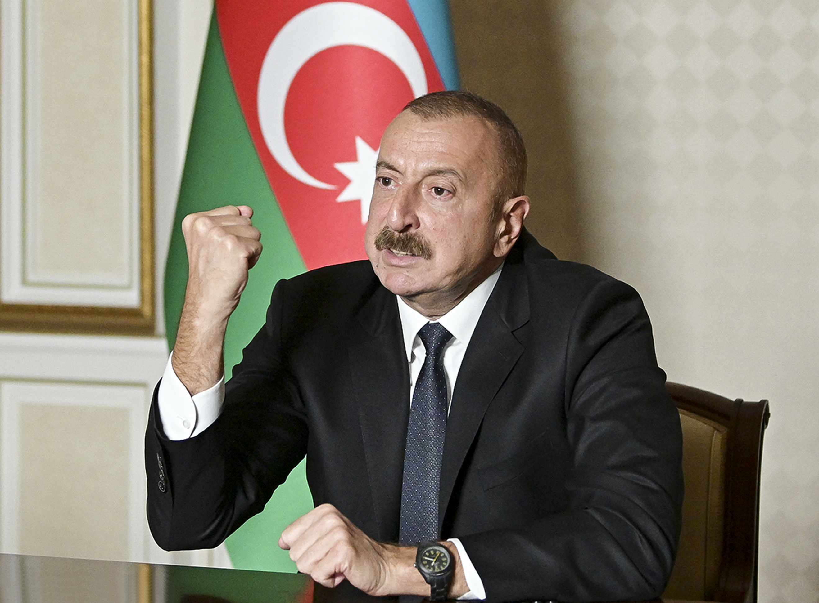 In this photo provided by the Azerbaijan's Presidential Press Office on Oct 20, 2020, Azerbaijani President Ilham Aliyev gestures as he addresses the nation in Baku, Azerbaijan [Azerbaijani Presidential Press Office via AP]
