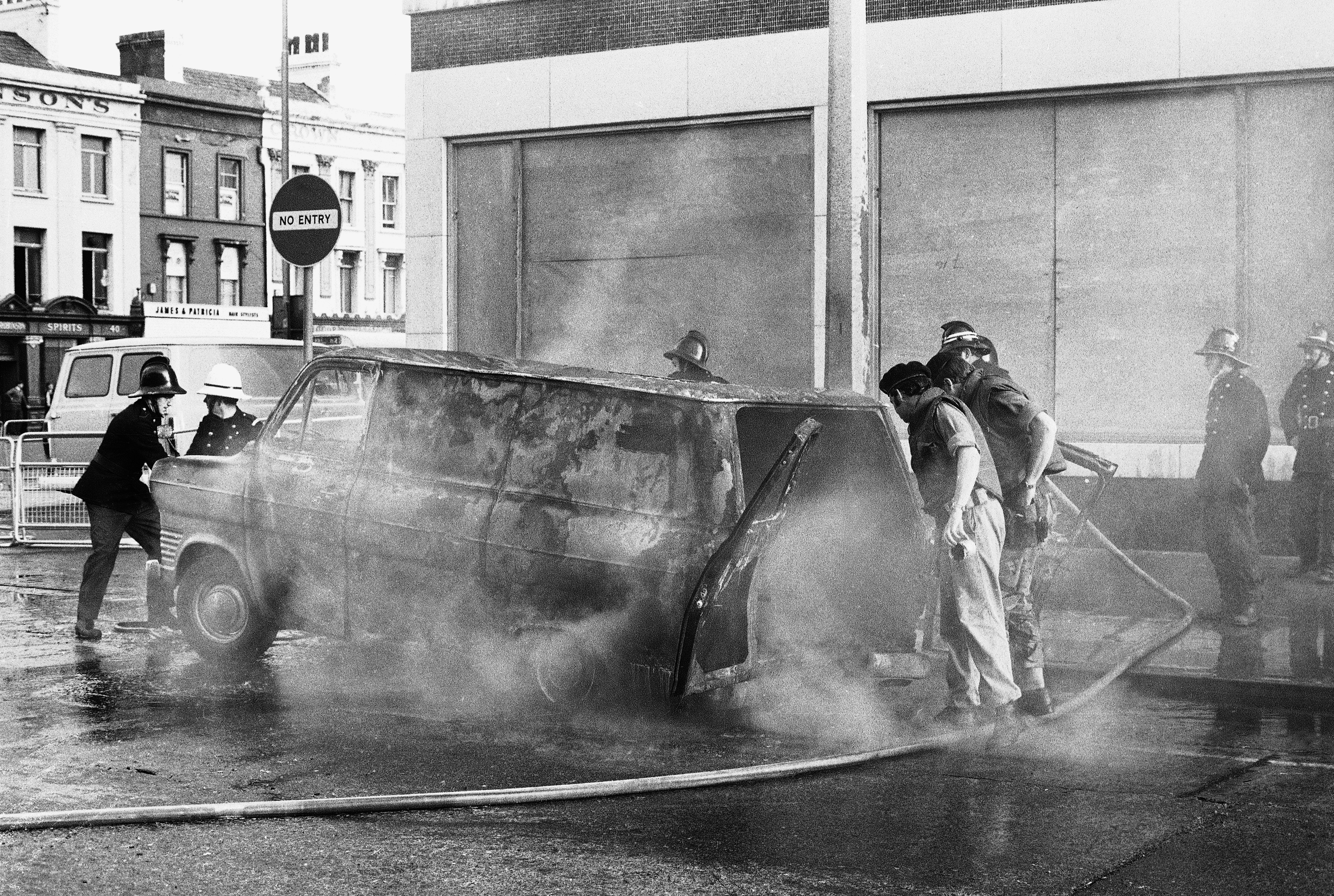 A soldier holds a timing device he has retrieved from a bomb-laden van outside the hotel on September 7, 1972