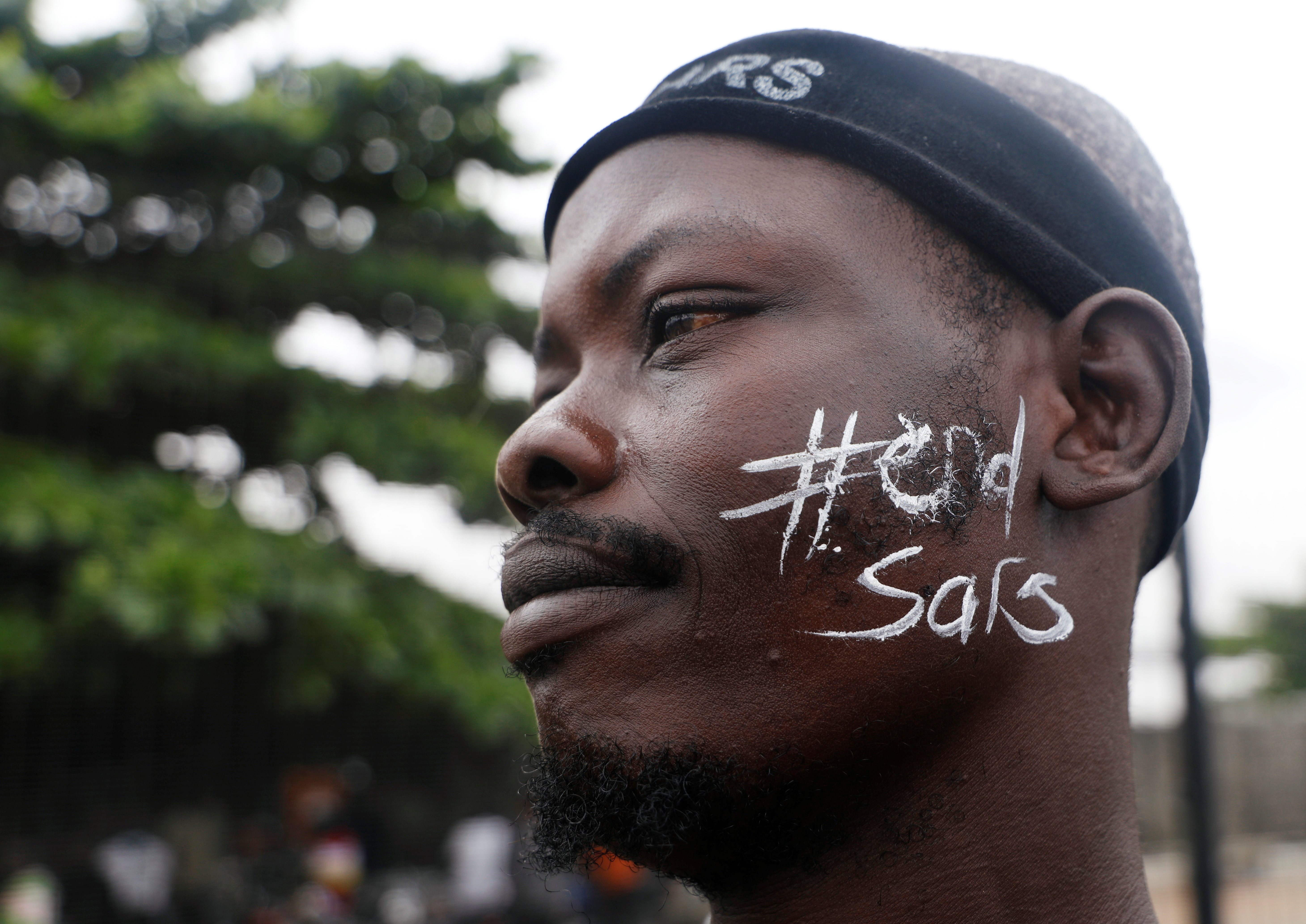 A demonstrator protests against Nigeria's Special Anti-Robbery Squad (SARS) in Lagos on October 17 [Temilade Adelaja/Reuters]