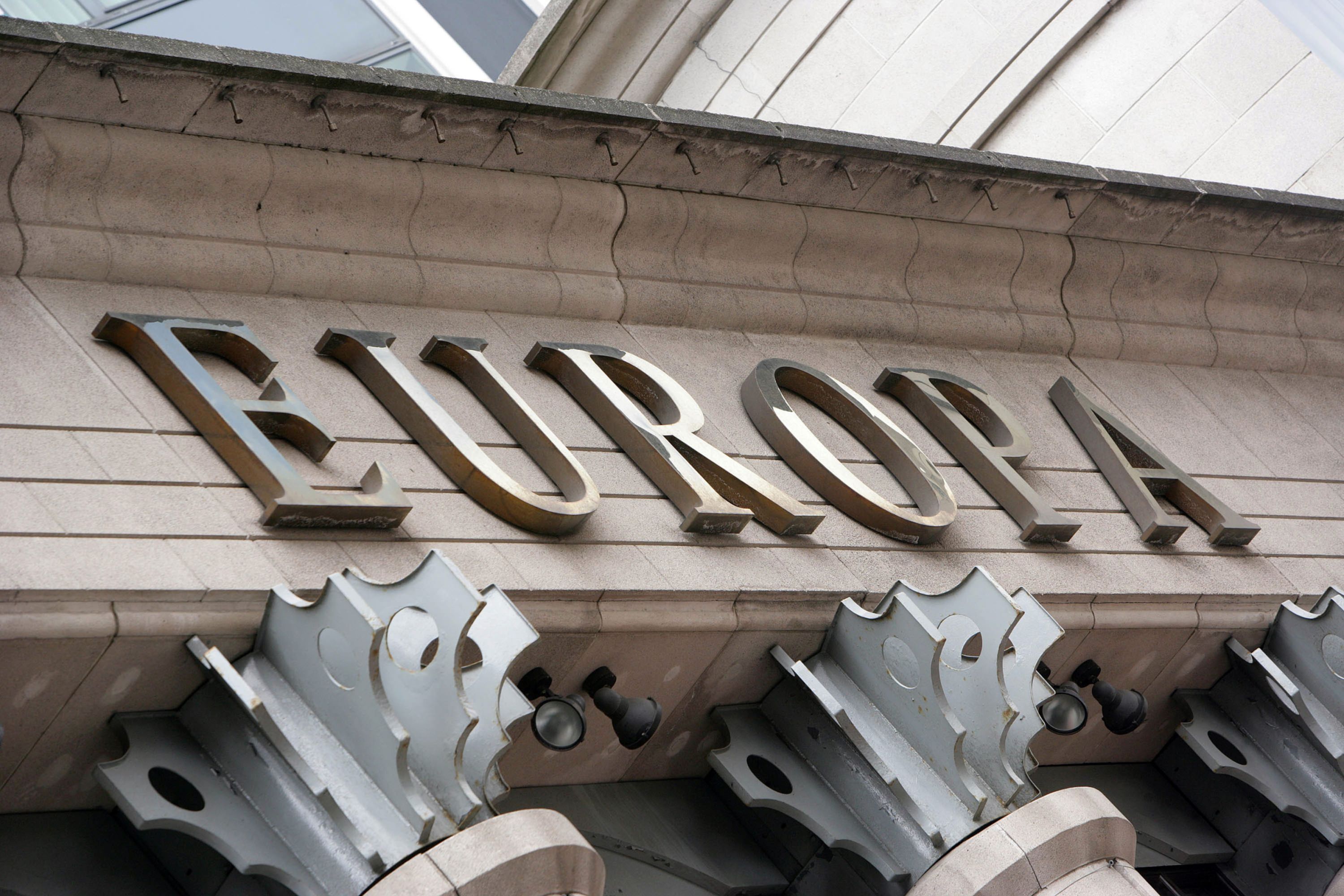 The logo for the Europa Hotel hangs outside the building