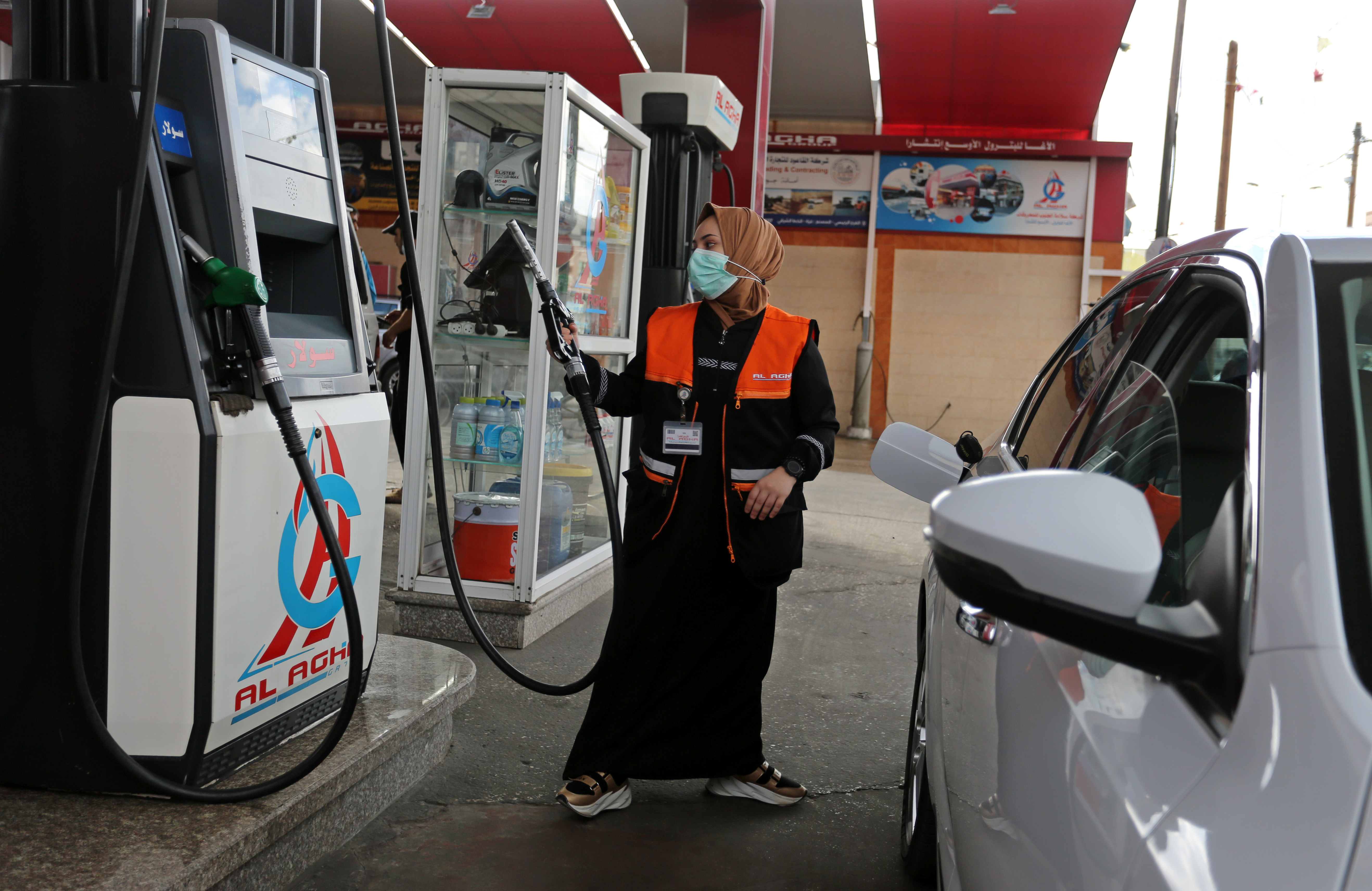 Female taxi driver and other women in Gaza