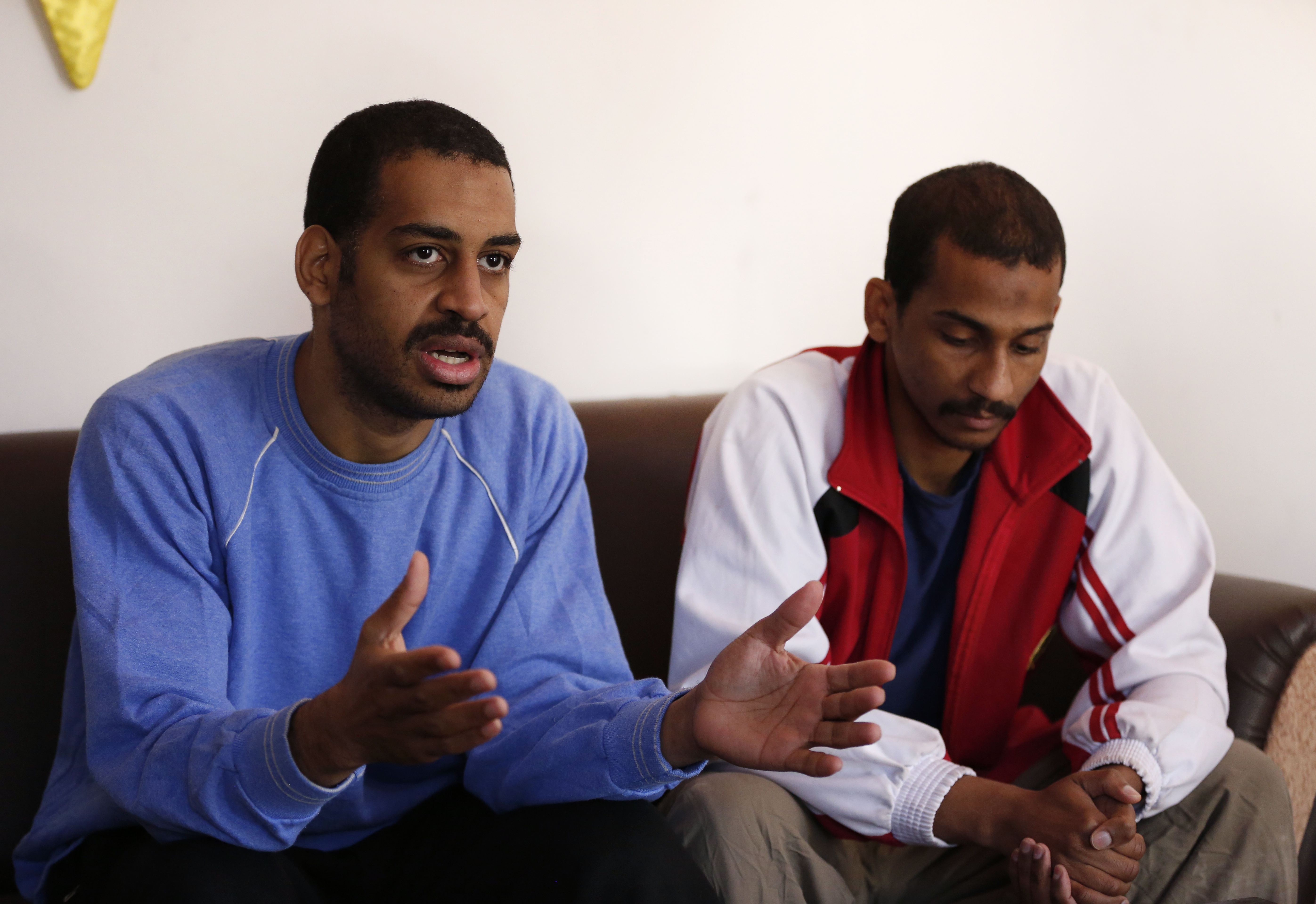 Accused ISIL members Alexanda Kotey and El Shafee Elsheikh sit next to each other during an interview