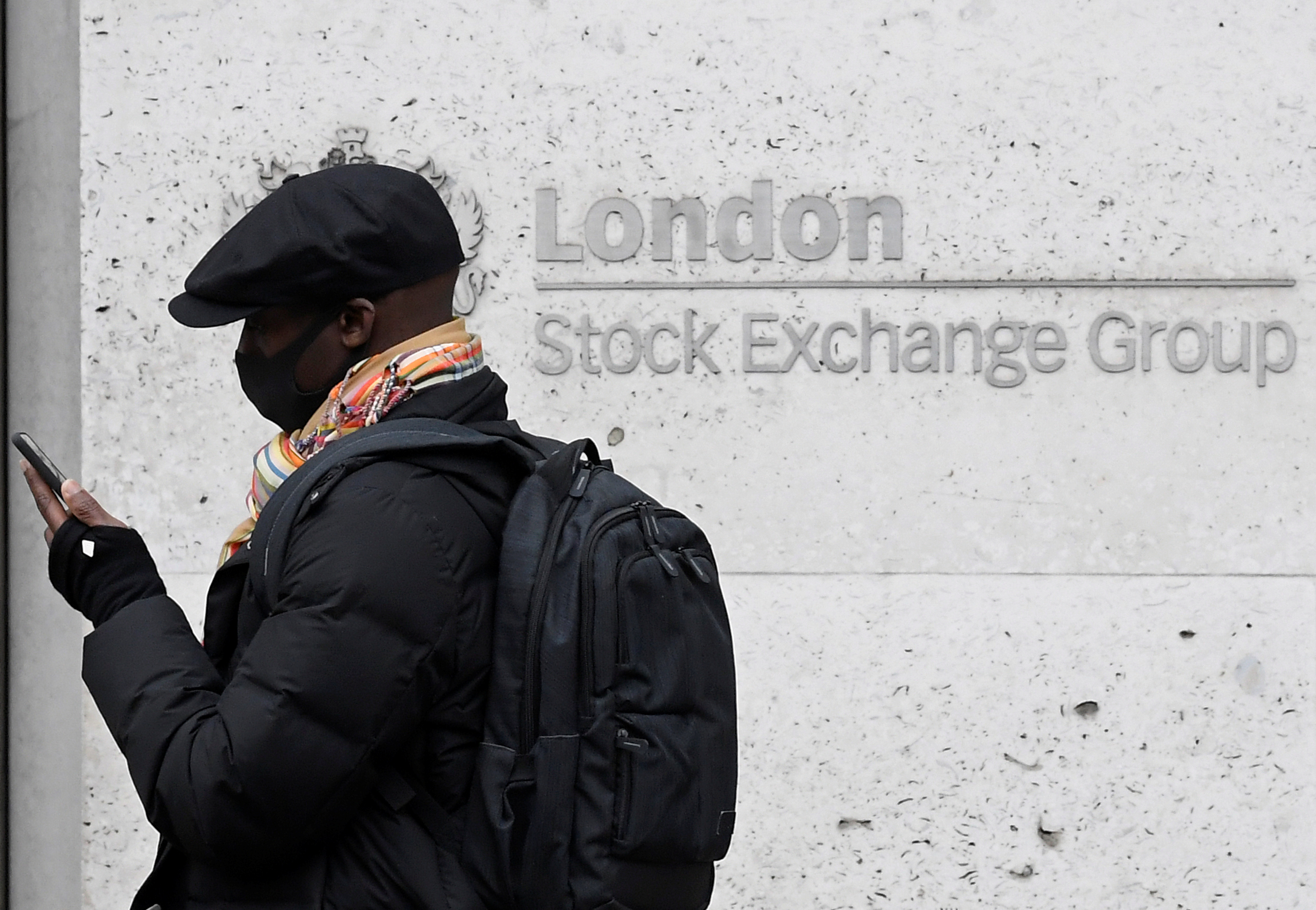 News of a new strain of coronavirus in the UK has affected Asian stocks as well as the British pound [File: Toby Melville/Reuters]