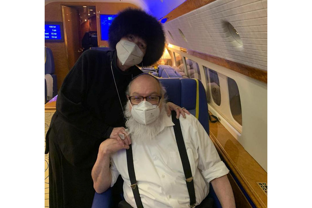 Jonathan Pollard and his wife Esther, pose for a picture on a private plane flying to Israel December 30, 2020