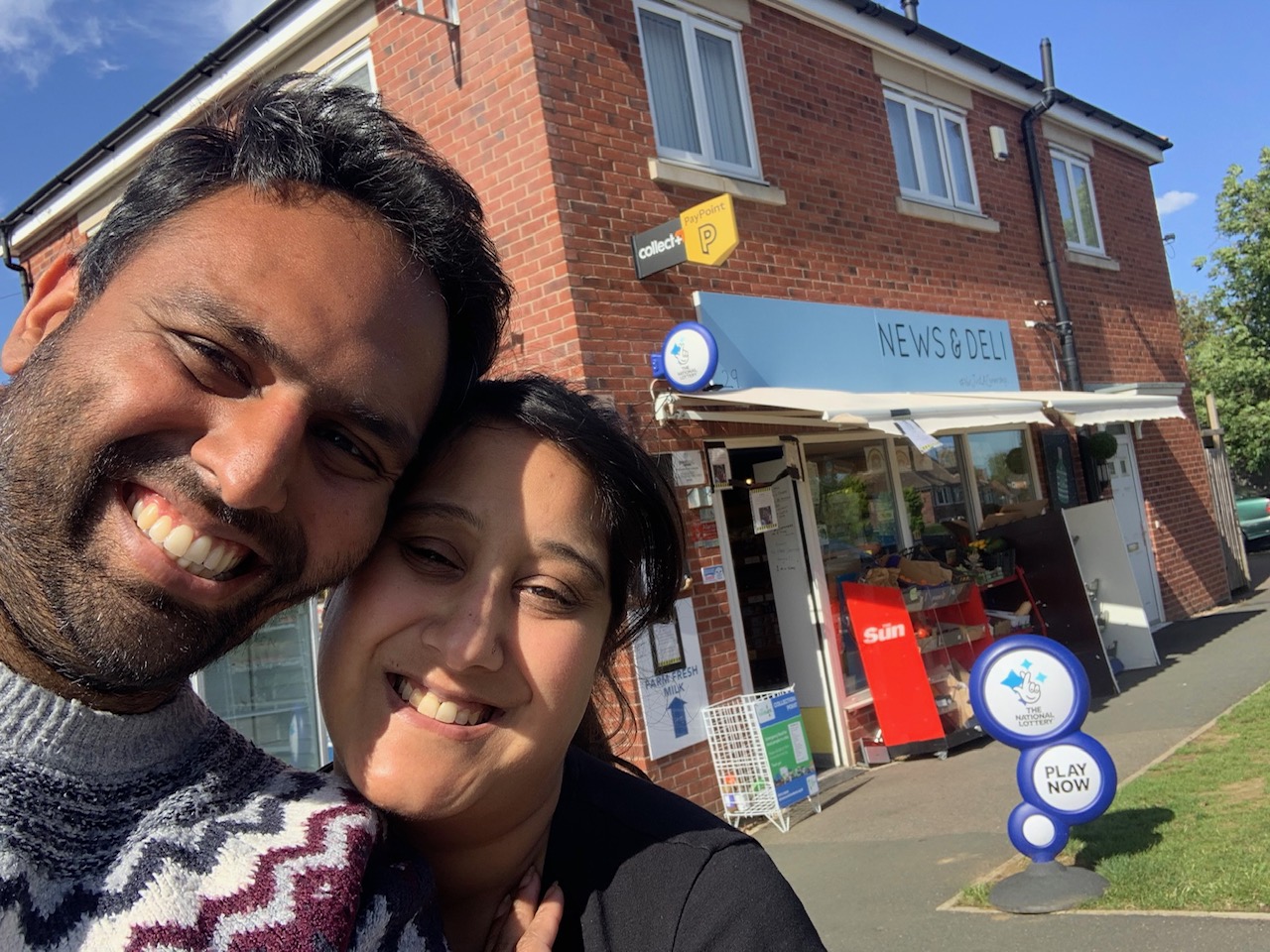 Master family in front of their shop Wigston Fields News & Deli