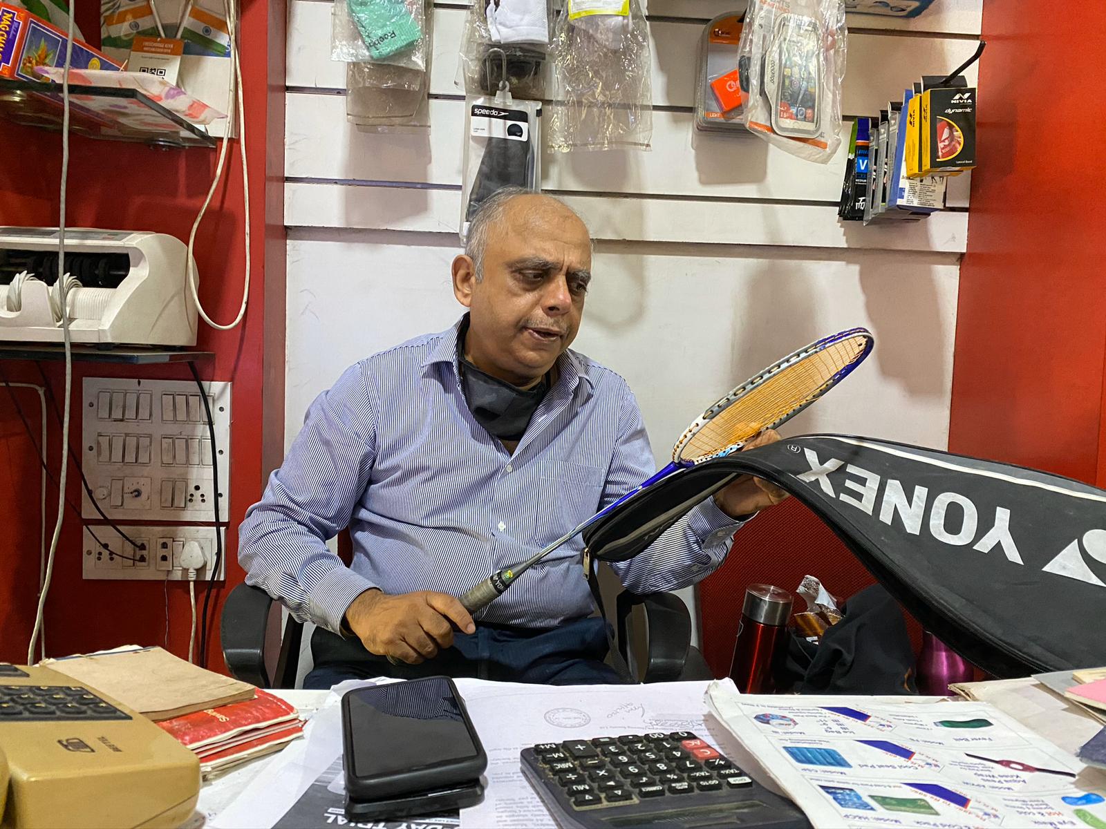 Manohar Wagle, 62, owner of the Wagle Sports shop in Mumbai, says his small business was forced to respond to a sudden shift in shopping habits as customers sought to shop online due to the coronavirus pandemic [File: Tish Sanghera/Al Jazeera]