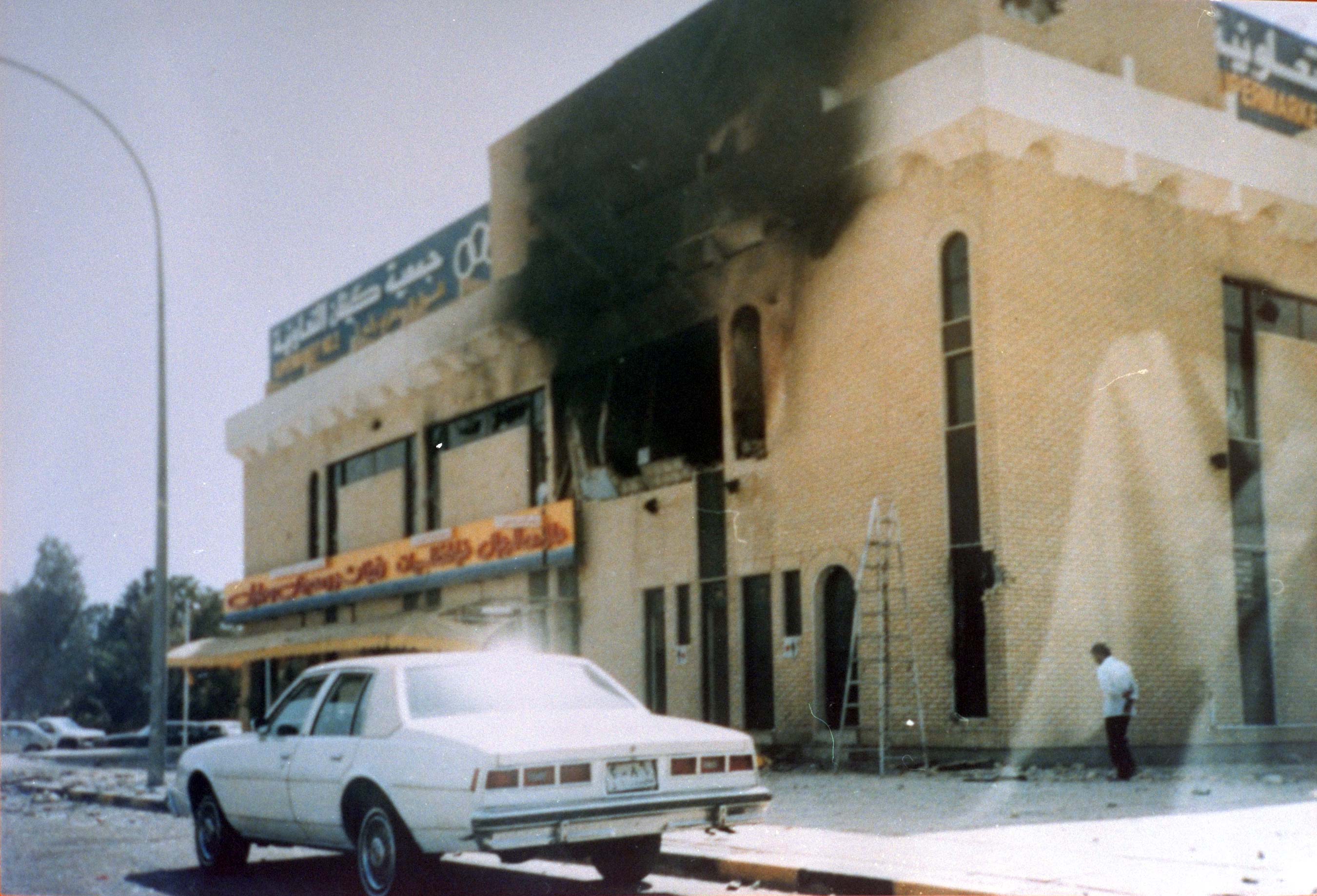 Smoke billows from the Kifan cooperative in Kuwait City that allegedly came under Iraqi army shellfire in the early days of the invasion of Kuwait. (The photograph was provided by the Beirut bureau of the Kuwaiti official news agency Kuna Tuesday.) (AP Photo)