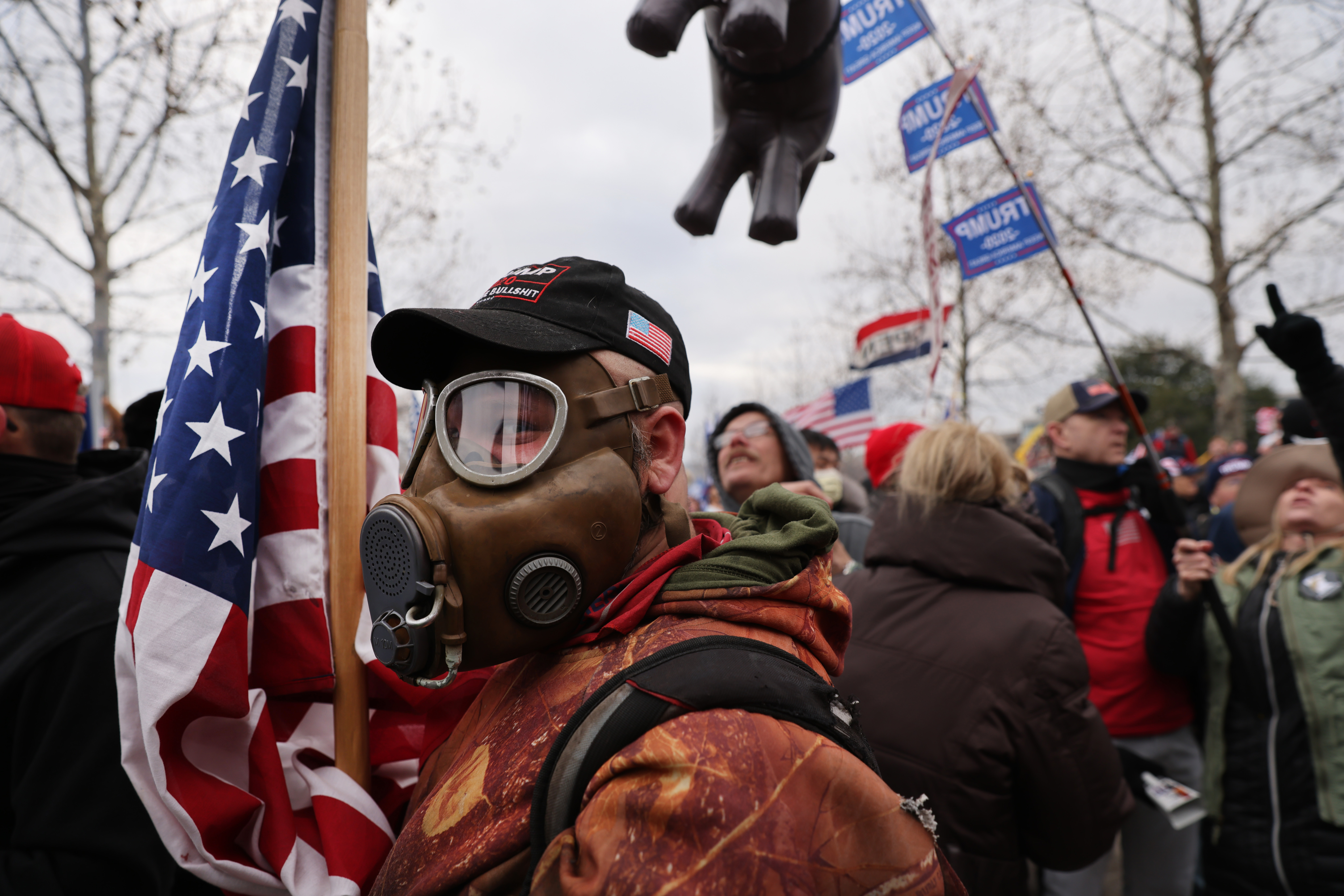 Trump supporters gather outside the US Capitol building following a 'Stop the Steal' rally on January 6 in Washington, DC; a pro-Trump mob stormed the Capitol building earlier, breaking windows and clashing with police officers [Spencer Platt/Getty Images]