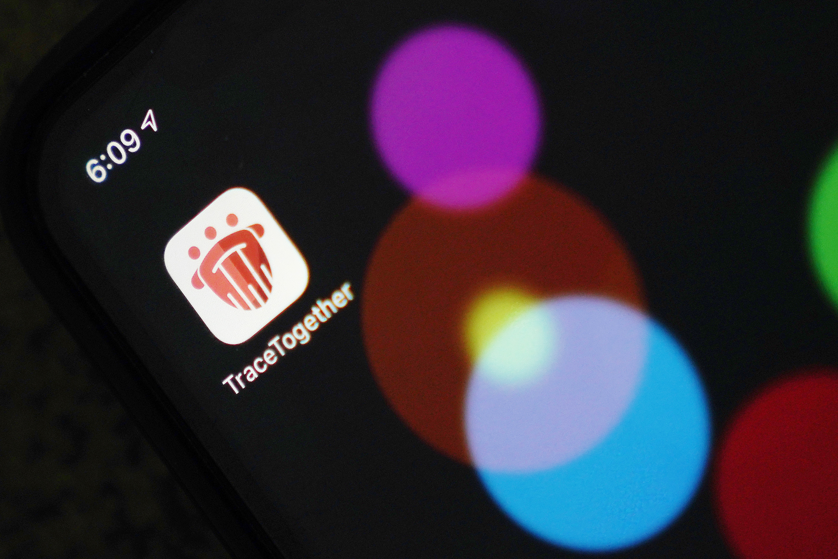 Singapore's COVID-19 tracing app has triggered a debate over data privacy and surveillance after it emerged police had used the data [How Hwee Young/EPA]