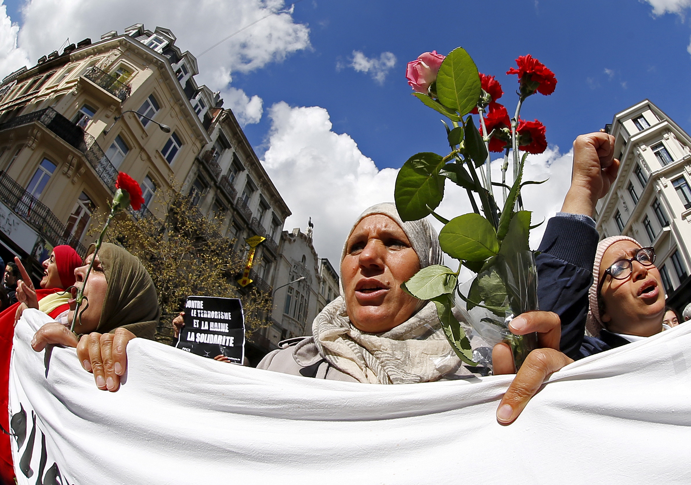 In this image from 2016, people take part in a rally called 'The march against the fear, Tous Ensemble, Samen Een, All Together' in memory for the victims of bomb attacks [Yves Herman/Reuters]
