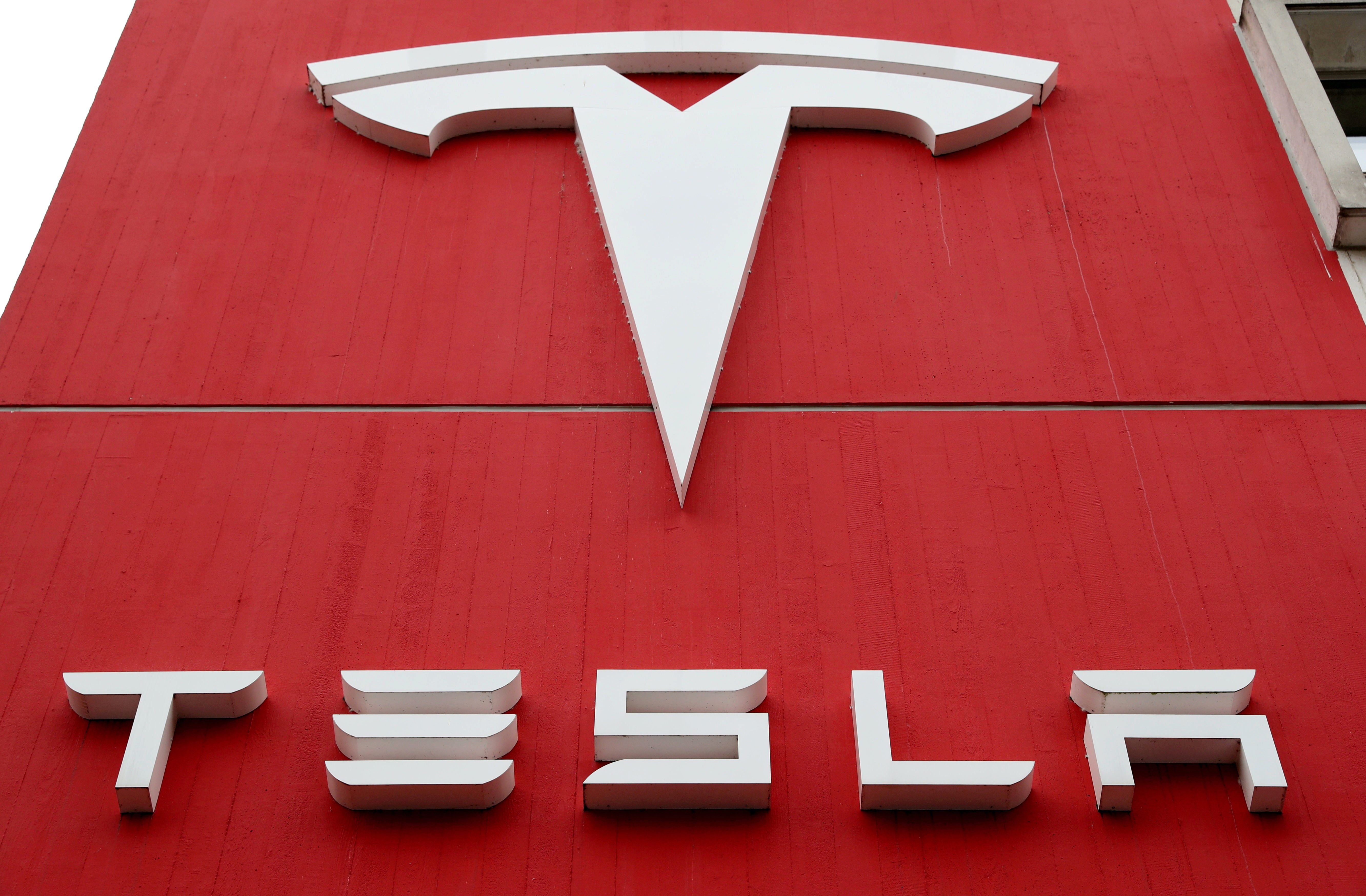 The logo of electric vehicle manufacturer Tesla