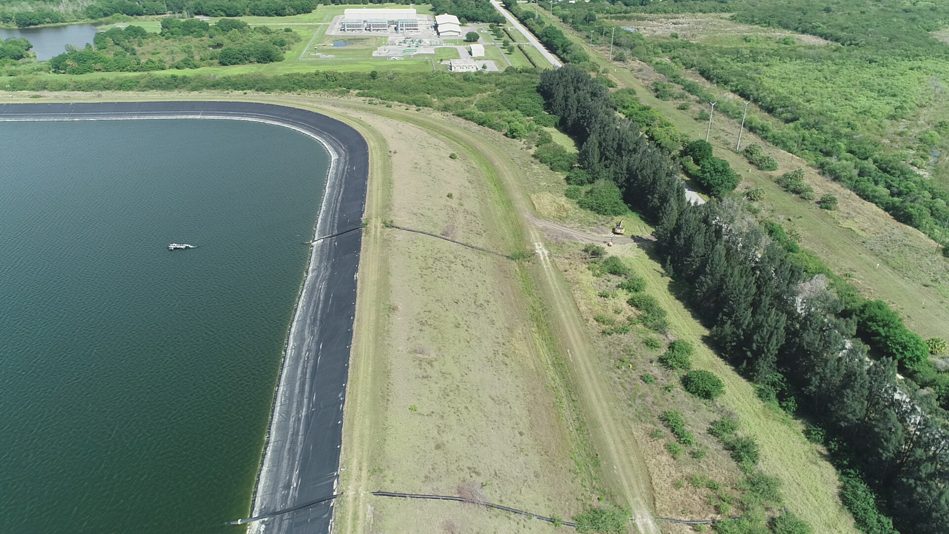 A reservoir of a defunct phosphate plant south of Tampa, where a leak at a wastewater reservoir forced the evacuation of hundreds of homes and threatened to flood the area and Tampa Bay with polluted water, is seen in an aerial photograph taken in Piney Point, Florida, April 4, 2021 [Drone Base via Reuters]