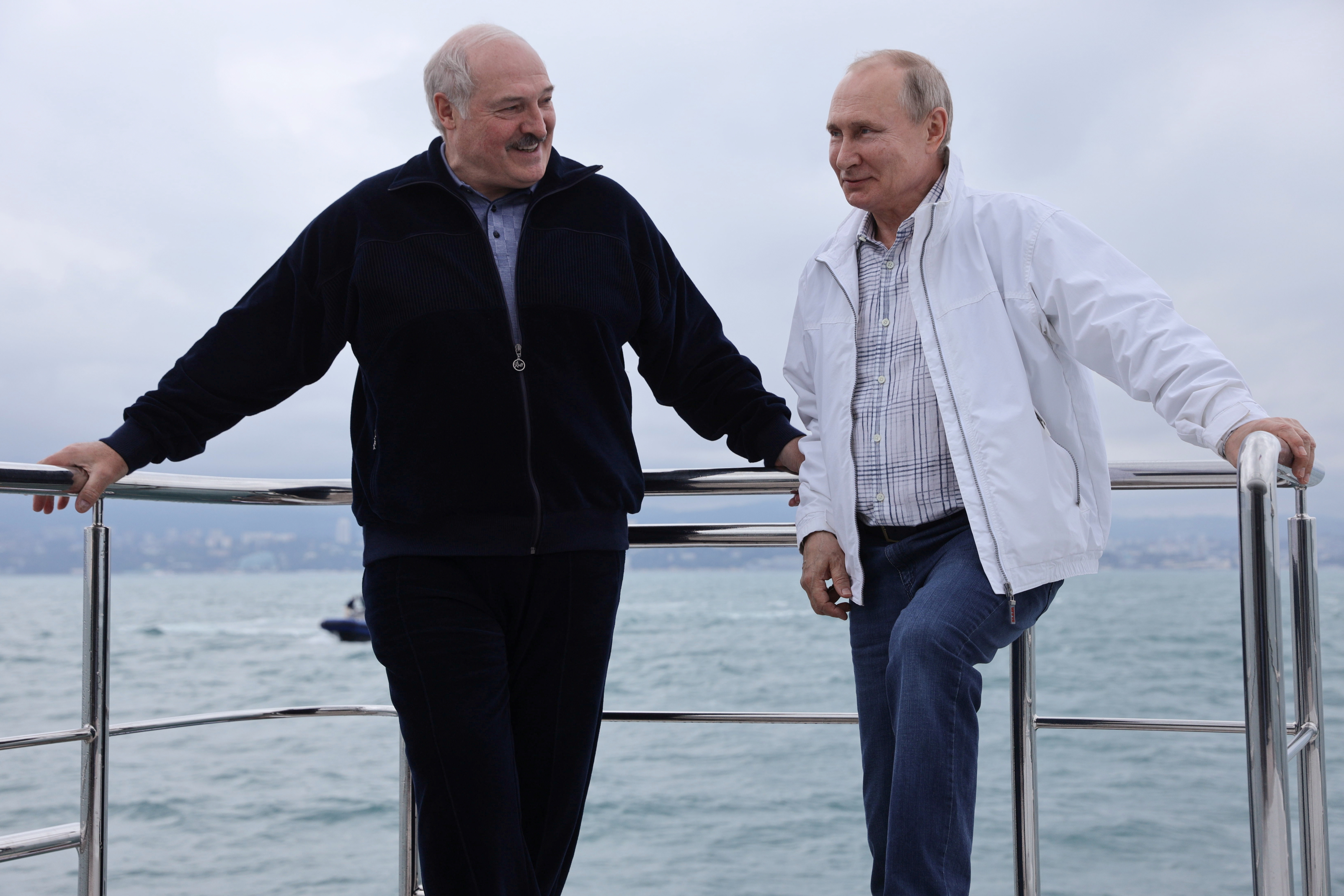 Russian President Vladimir Putin and his Belarusian counterpart Alexander Lukashenko posing by the sea