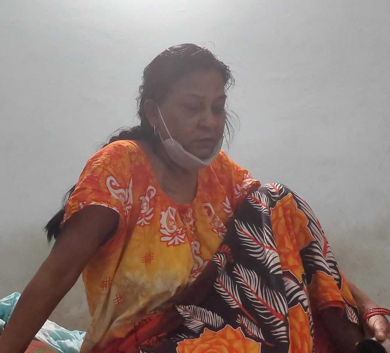 Lakshmi Yadav, 51, has tested positive for COVID and has missed dialysis appointments as the hospitals are overrun [Saurabh Sharma/Al Jazeera]