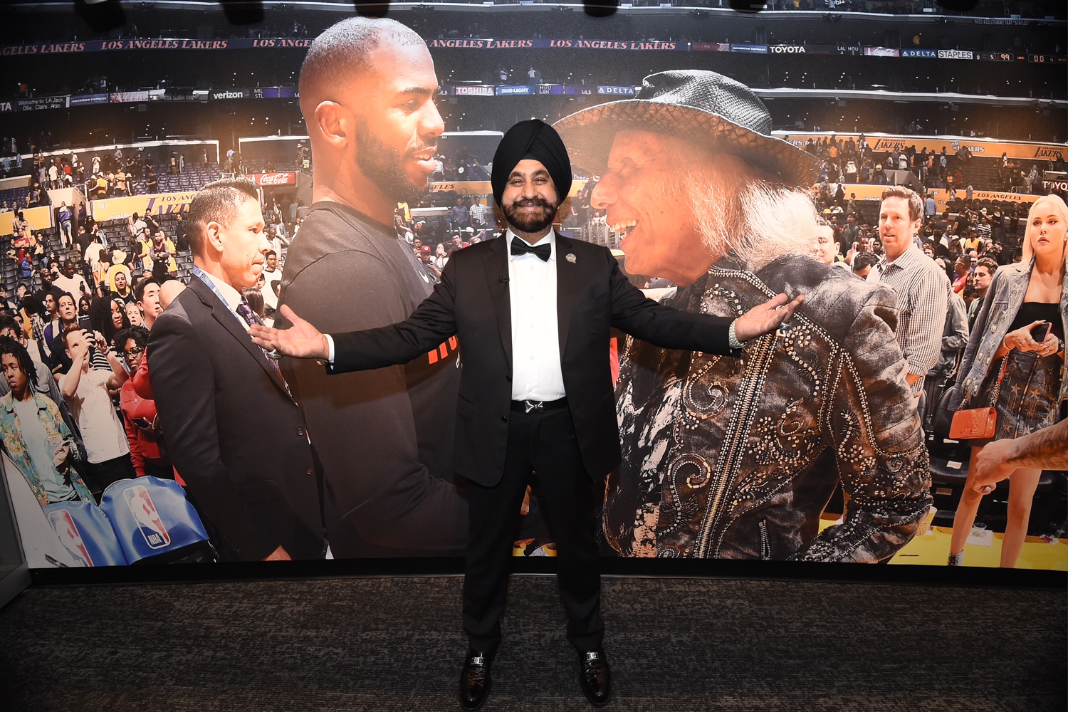 Nav Bhatia poses for a photo during the opening of the Super Fan exhibit on May 16, 2021 at the Naismith Memorial Basketball Hall of Fame in Springfield, Massachusetts [Andrew D Bernstein/NBA via Getty Images]