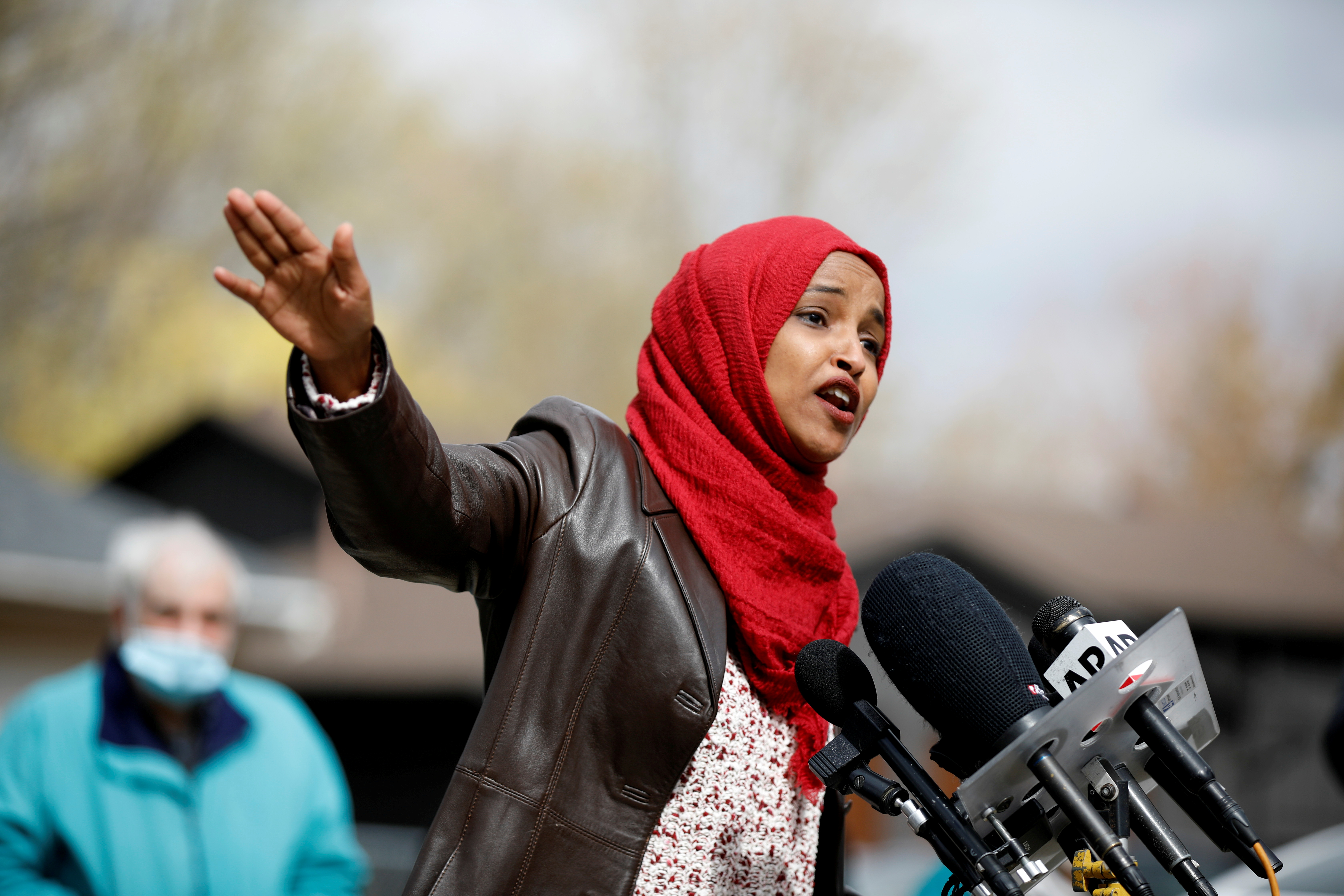 US Representative Ilhan Omar addresses the media and community organisers at a press conference at the vigil site for Daunte Wright in Brooklyn Center, Minnesota.