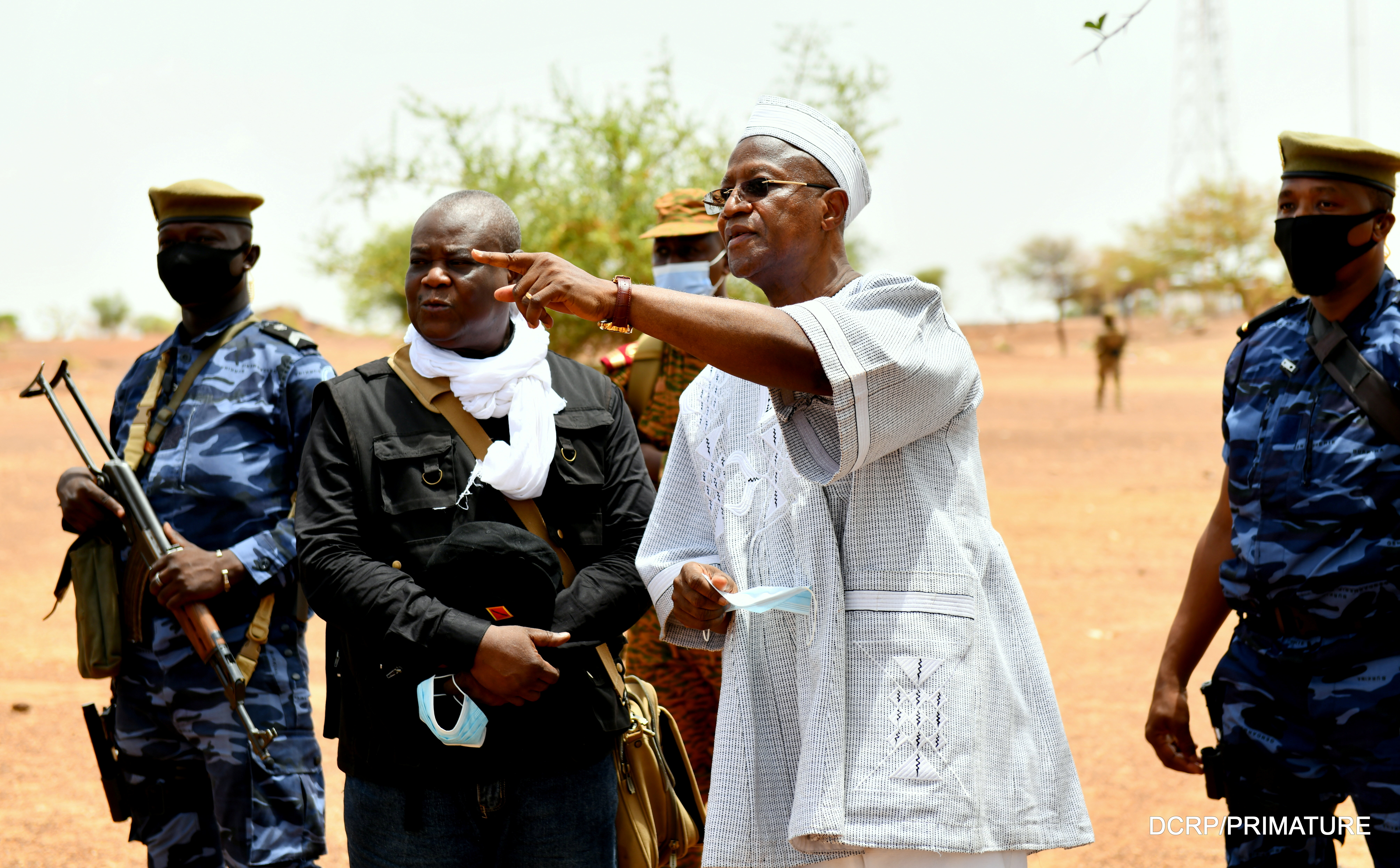 Burkina Faso's Prime Minister Christophe Joseph Marie Dabire gestures during a visit at the site of the attack in the village of Solhan, [Burkina Faso Prime Minister's Press Service/Handout via Reuters]