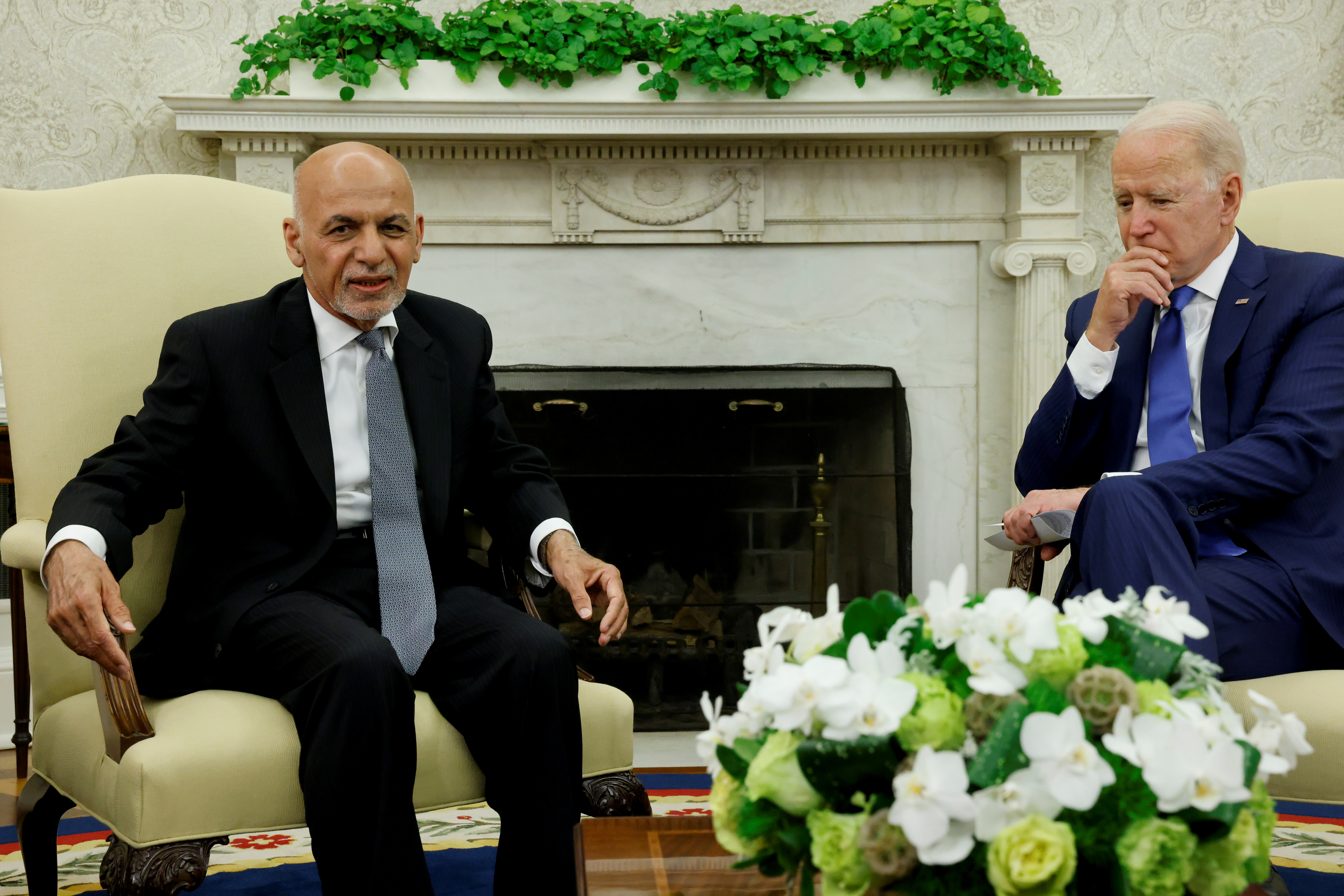 President Joe Biden meets with Afghan President Ashraf Ghani at the White House. [Jonathan Ernst/Reuters]