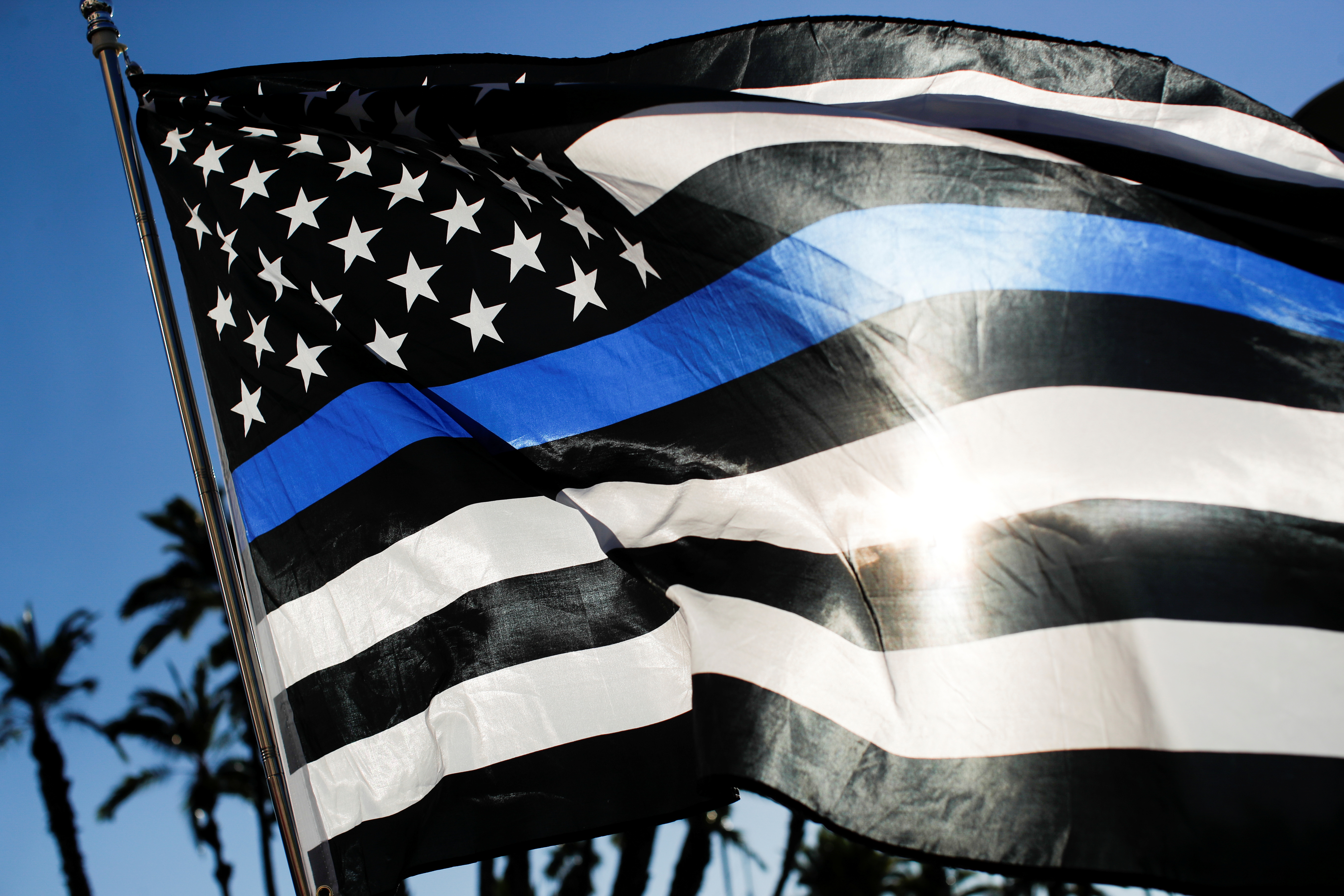 A Blue Lives Matter flag is pictured in San Diego, California on November 16, 2020 [File: Mike Blake/Reuters]