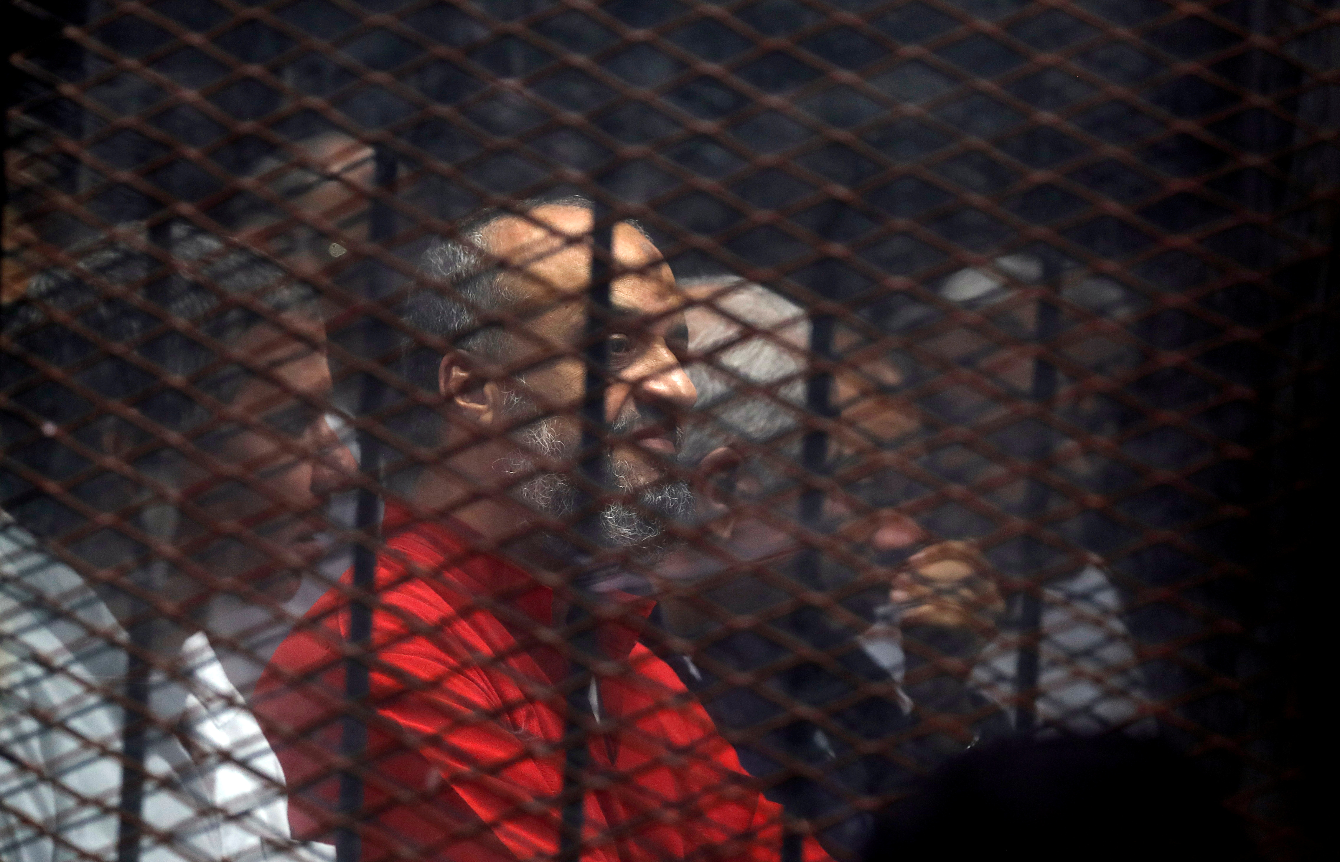 Muslim Brotherhood's senior member Mohamed El-Beltagi sits behind the bars during a court session in Cairo on December 2, 2018 [File: Reuters/Amr Abdallah Dalsh]
