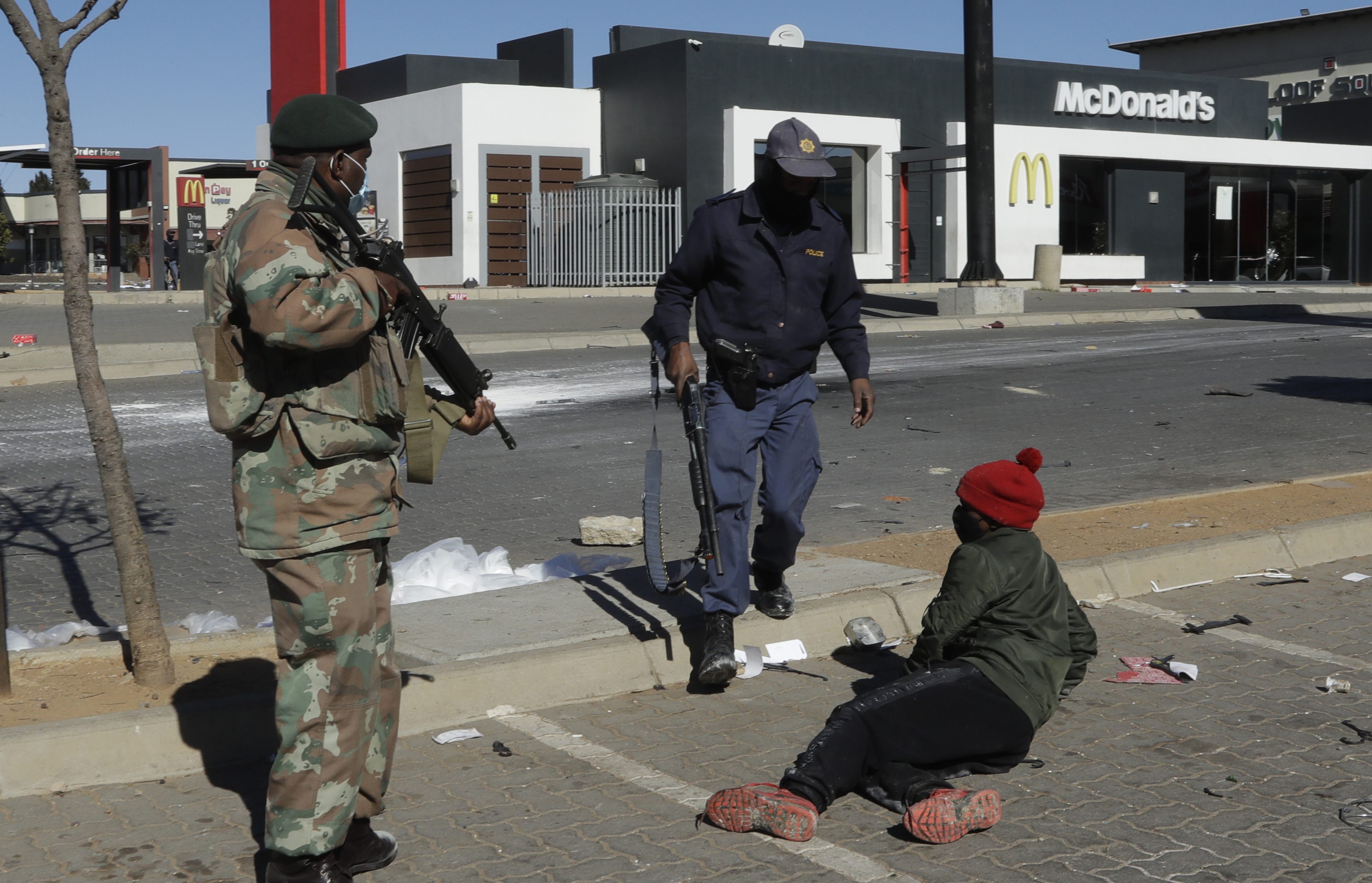 Some 200 malls and shopping centres countrywide have been affected by the violence and forced to close [Themba Hadebe/AP Photo]