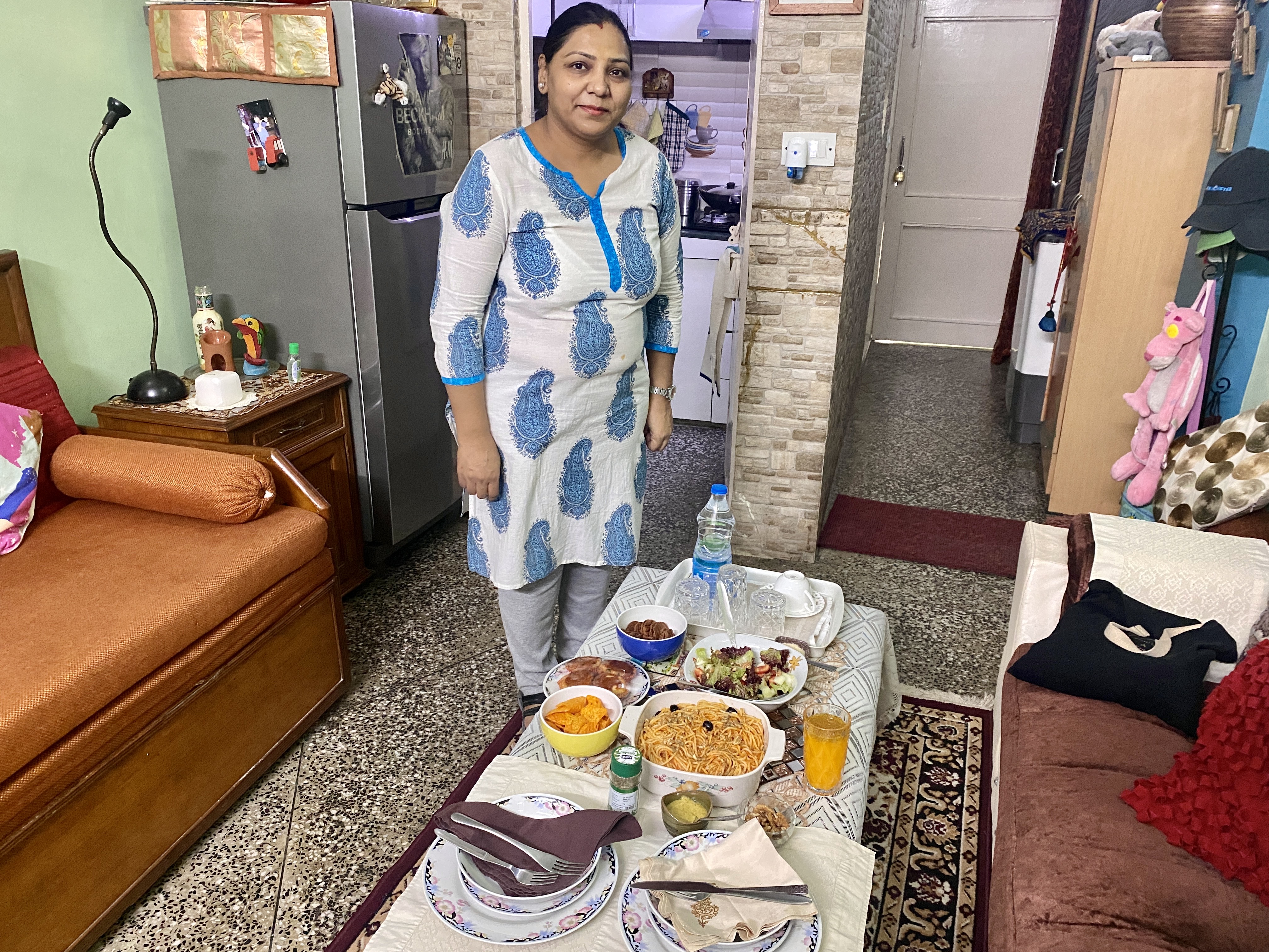 During the coronavirus pandemic, Aarti Prakash has prepared her catering orders from her modest kitchen in her one-bedroom apartment in central Delhi, trying to make ends meet [Photo courtesy of Astha Rajvanshi]