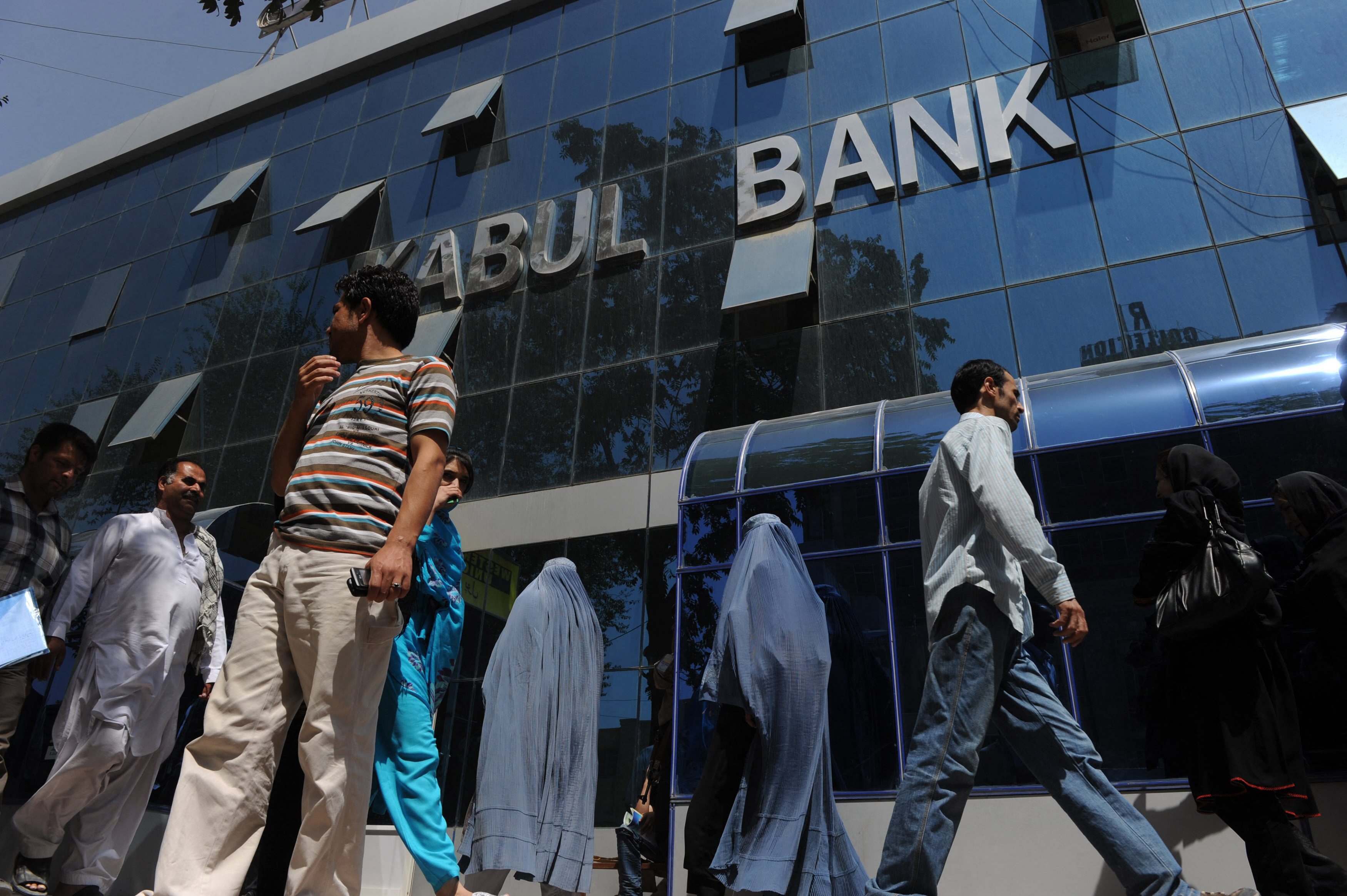 Most banks in Kabul have remained closed and nearly all ATMs are out of cash [Shah Marai/AFP]
