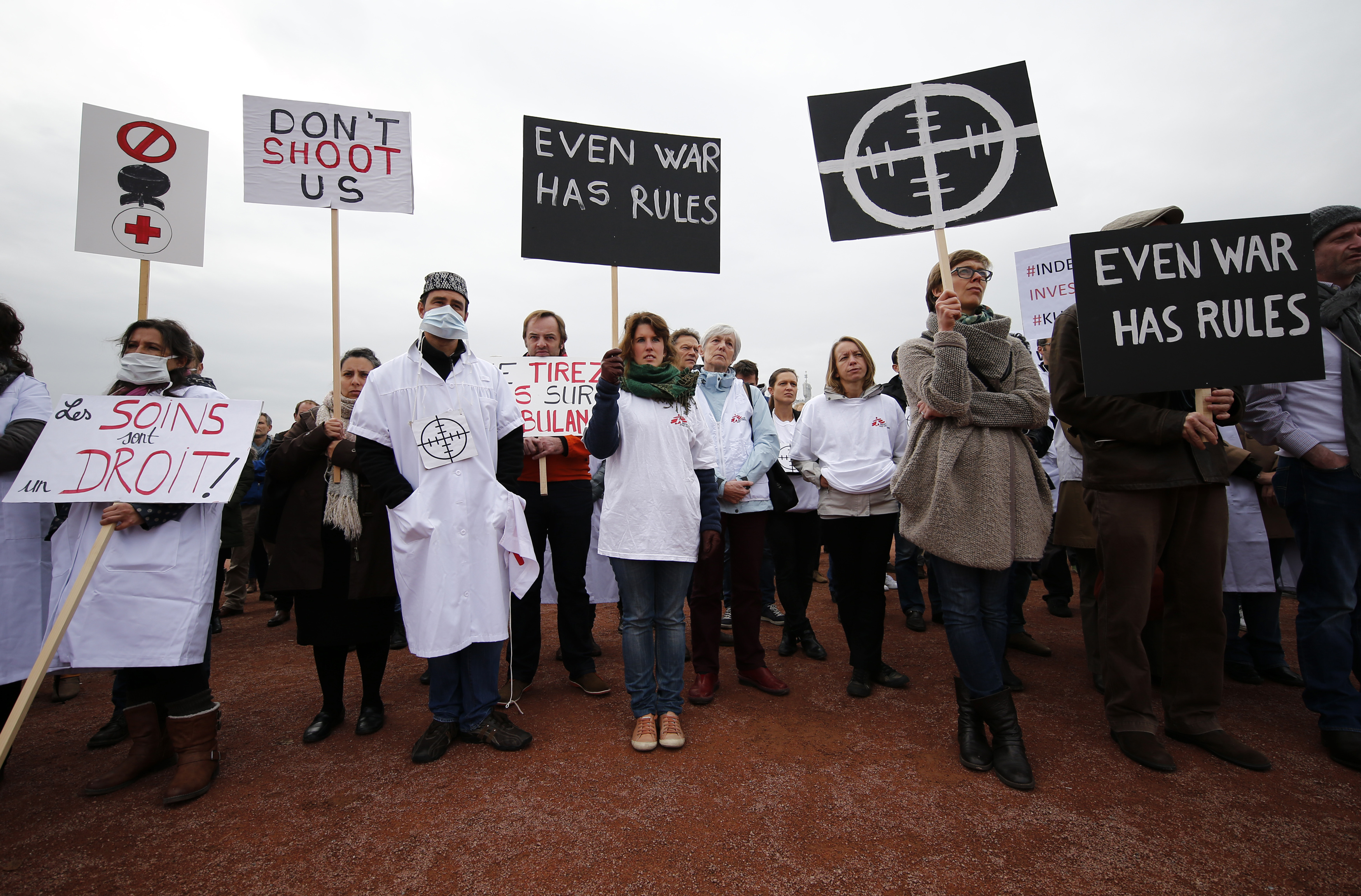 The staff of Medecins Sans Frontieres (MSF), also known as Doctors Without Borders, demonstrates in Geneva on November 3, 2015, one month after the US bombing of their charity-run hospital in Kunduz in Afghanistan [File: Reuters/Denis Balibouse]