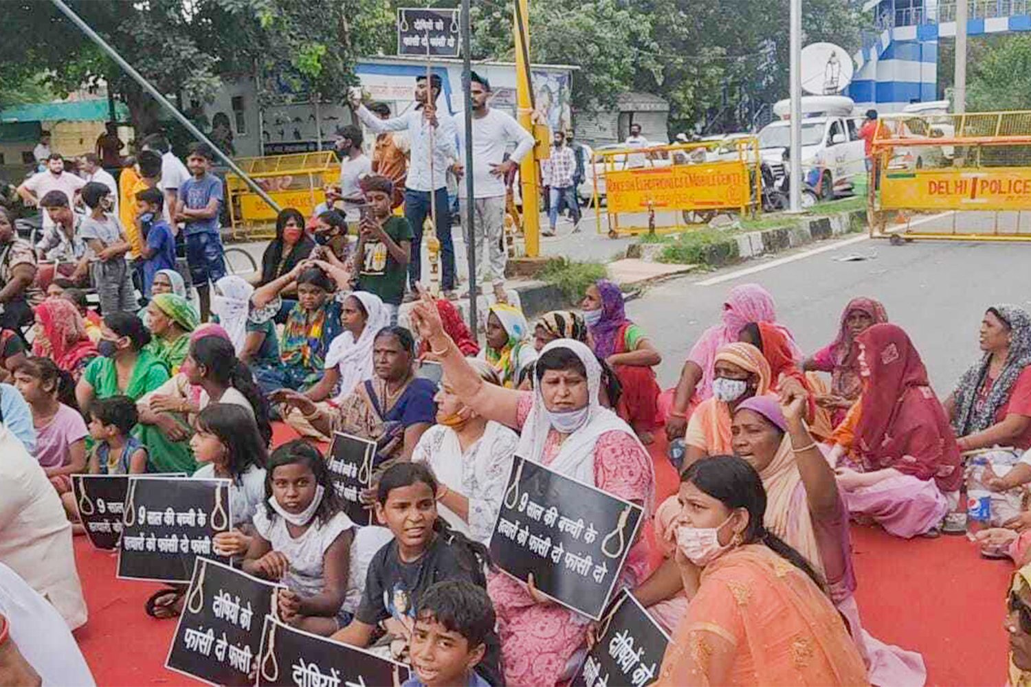 The girl's family, along with other Dalits and activists, is camping on a road in New Delhi's Nangal neighbourhood, demanding justice [Zafar Aafaq/Al Jazeera]