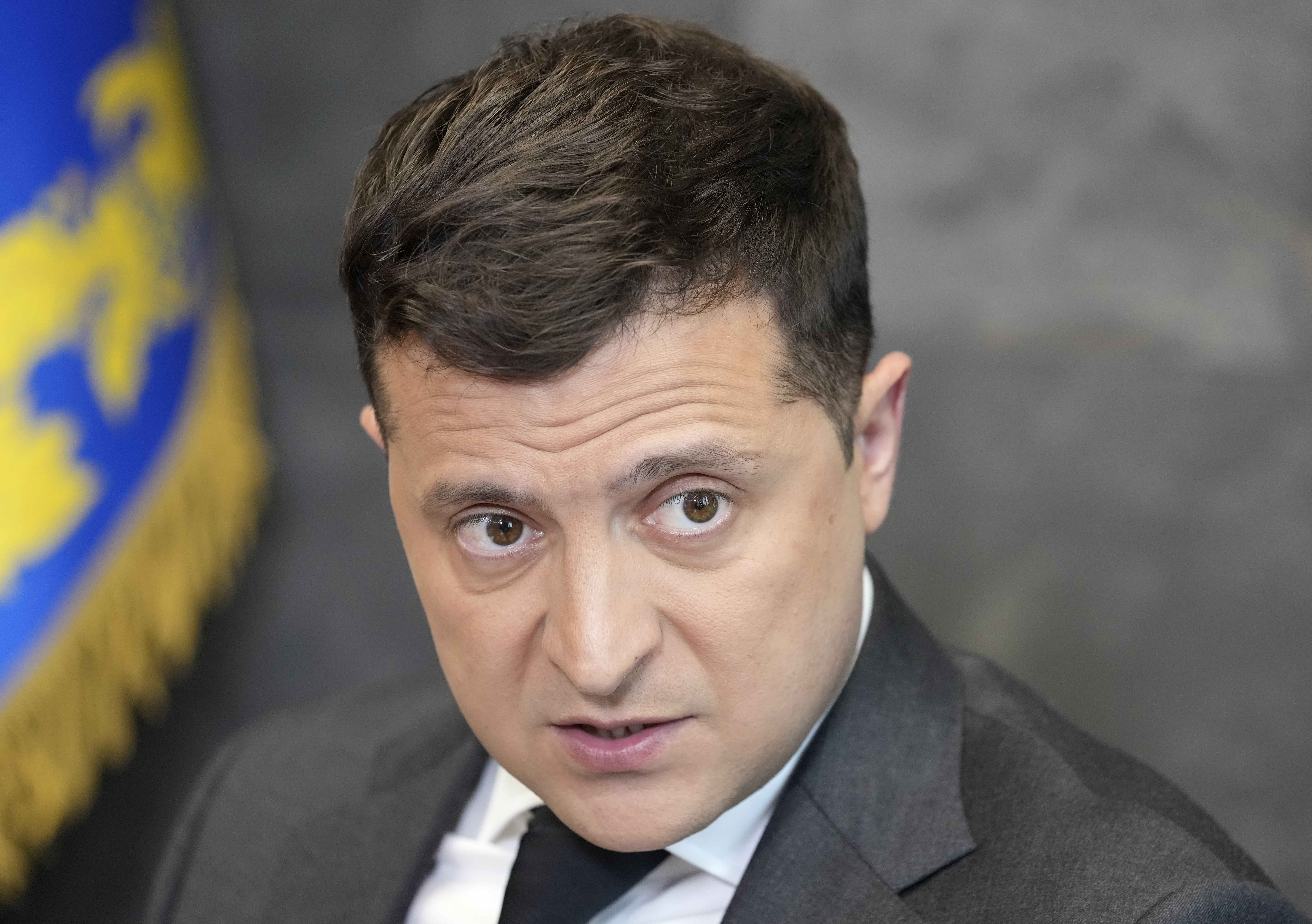 In this June 14, 2021, file photo Ukrainian President Volodymyr Zelenskyy gestures while speaking to the media during a news conference in Kyiv, Ukraine.