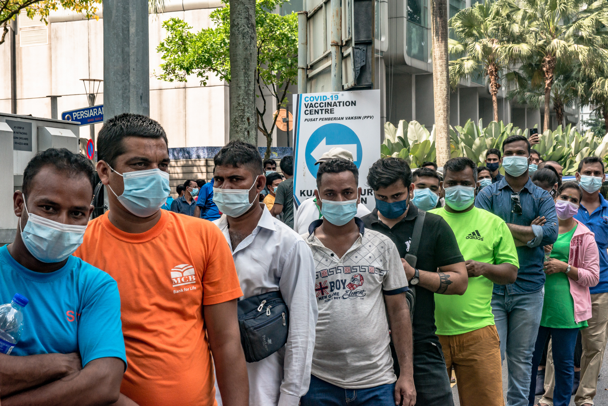 Migrant workers with papers have been vaccinated. Refugees and the millions who are undocumented will be able to walk in for their shots from Monday [Hasnoor Hussain/Al Jazeera]