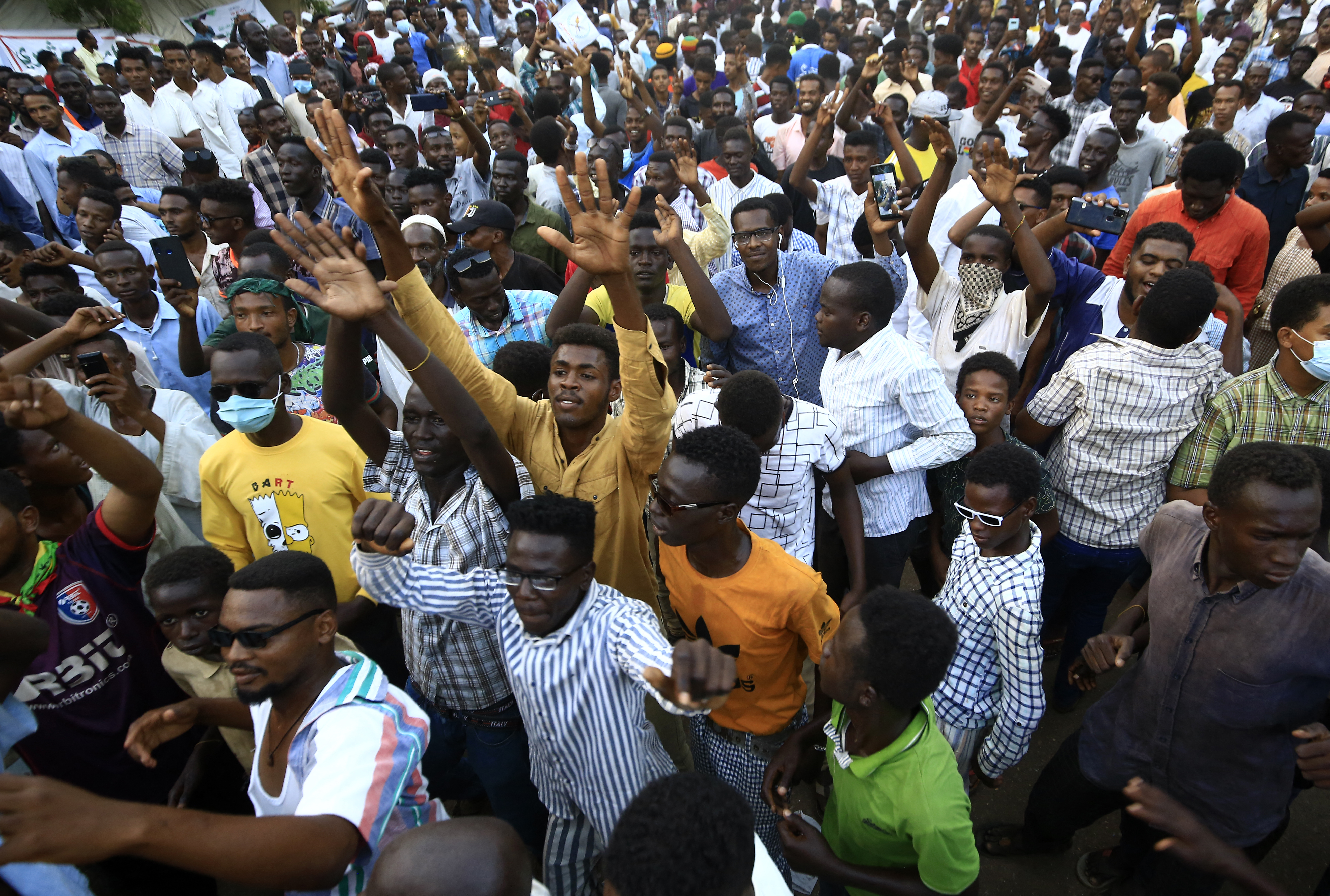 Protesters in Khartoum during a rally on Wednesday demanding the dissolution of the transitional government [Ashraf Shazly/AFP]