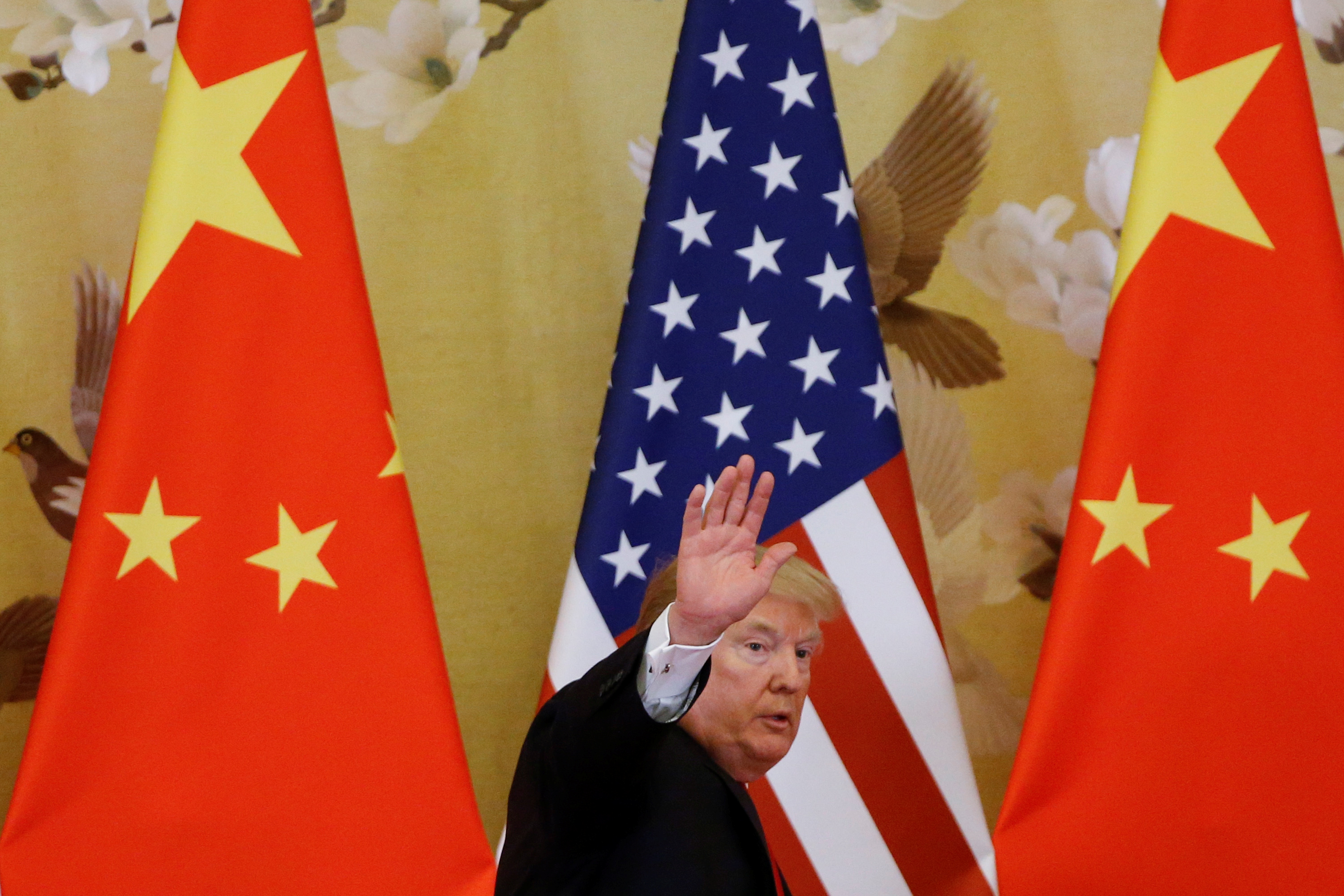 Former President Donald Trump visited Beijing in November 2017 before US-China relations soured [File: Thomas Peter/Reuters]