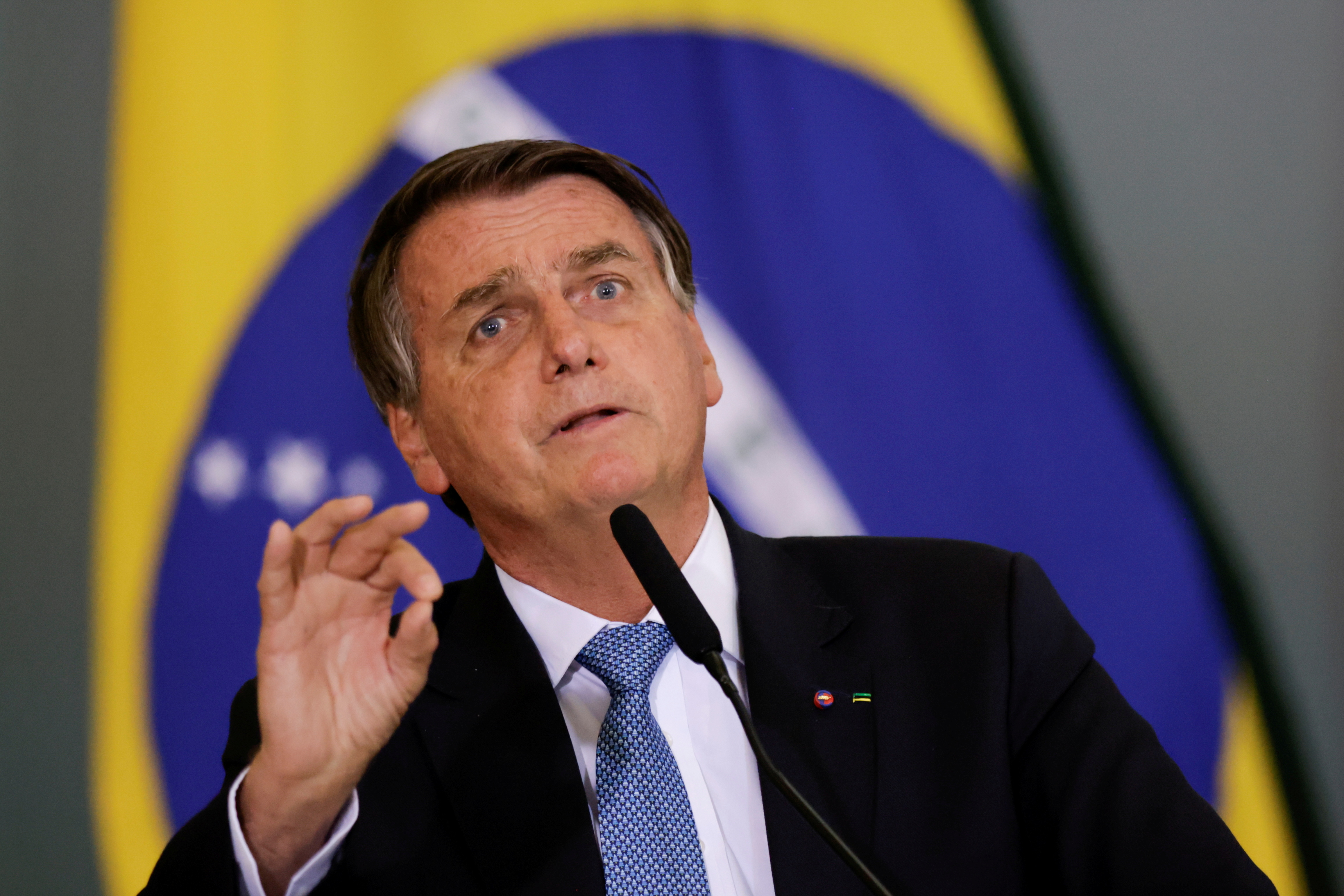 Brazil's President Jair Bolsonaro gestures during a ceremony in Brasilia, Brazil.