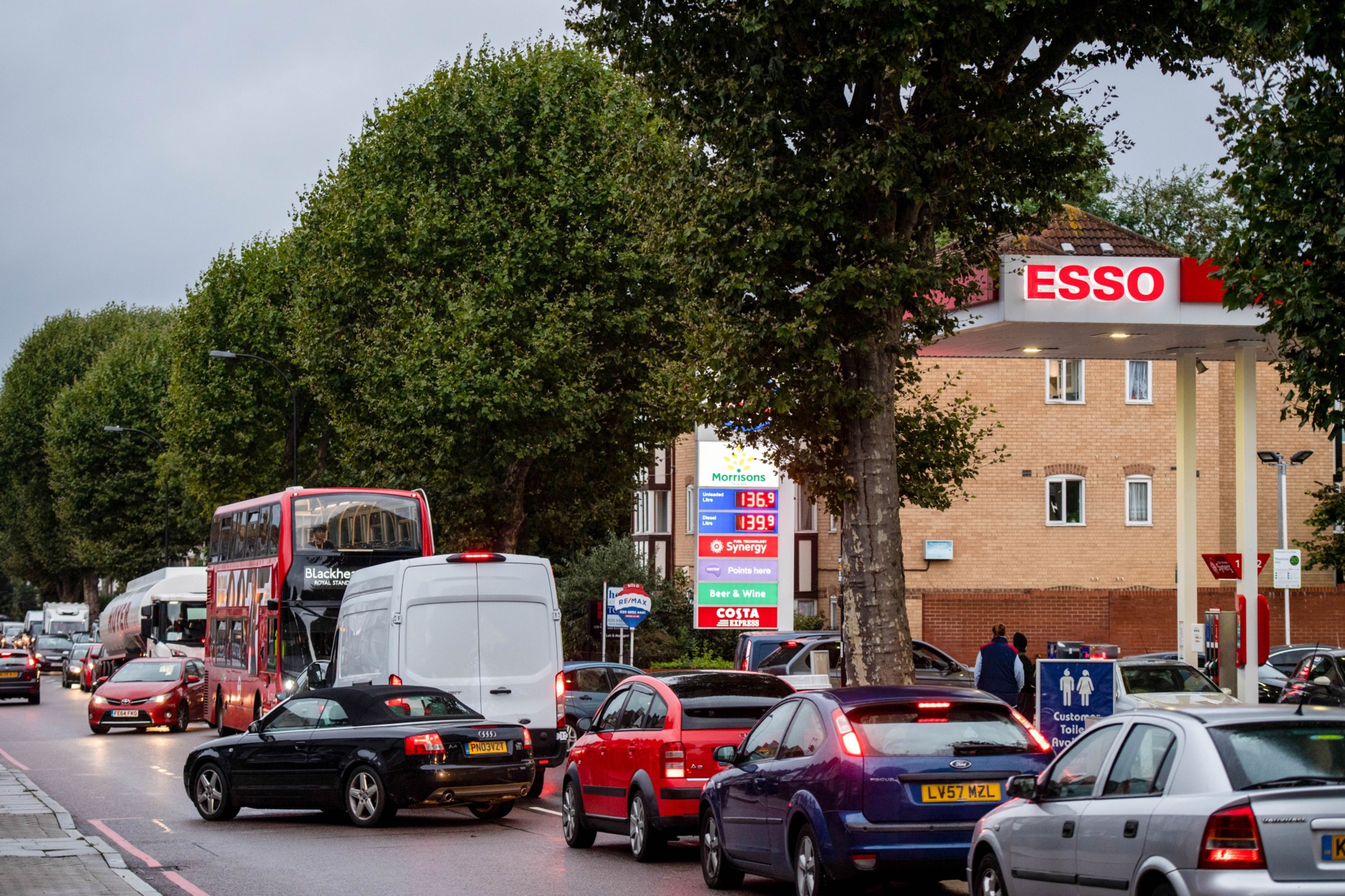 Motorists queue for fuel at an Esso petrol station in London.