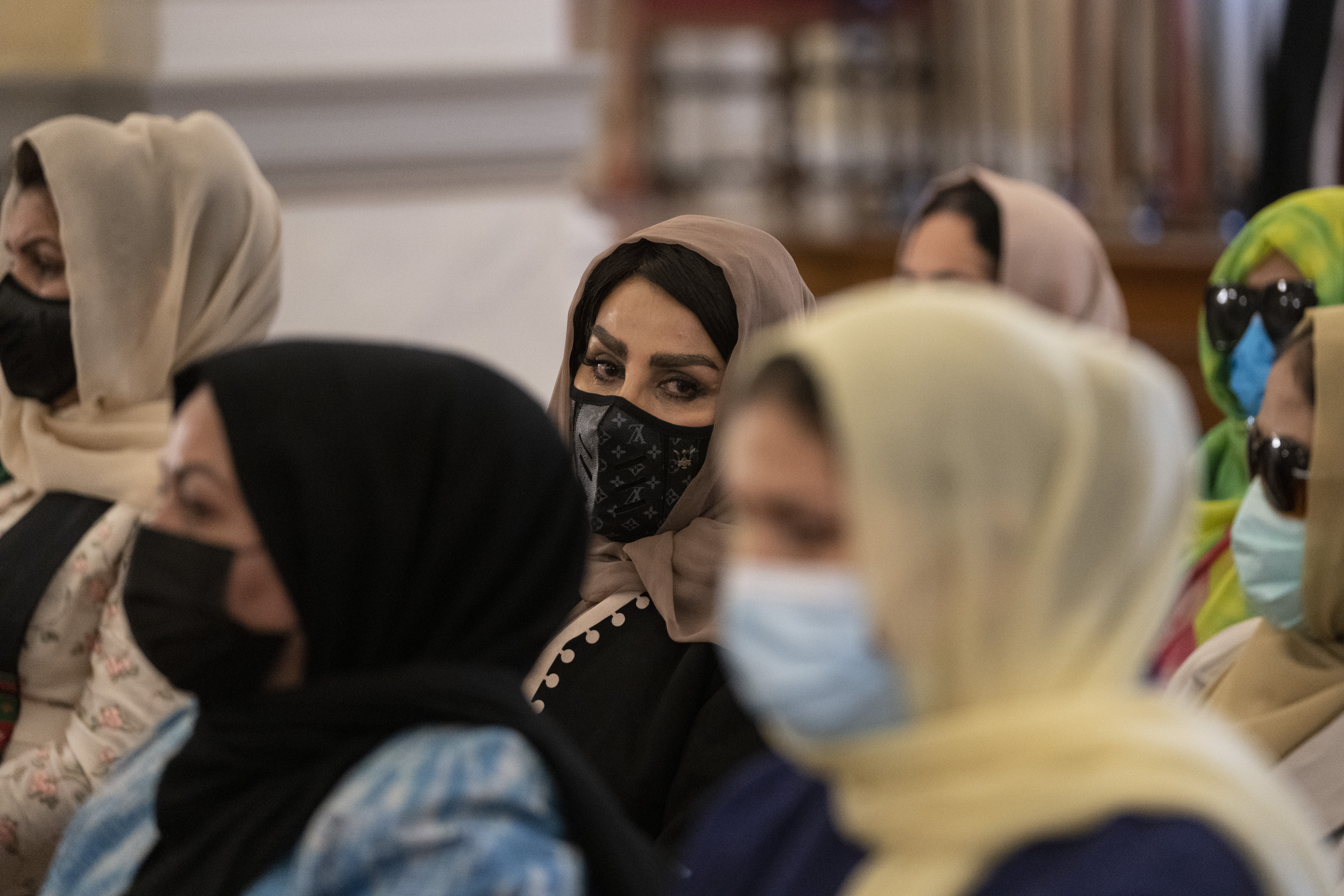 Afghan women judges and lawyers attend a meeting with Greek President Katerina Sakellaropoulou, at the Presidential Palace in Athens [Petros Giannakouris/AP]