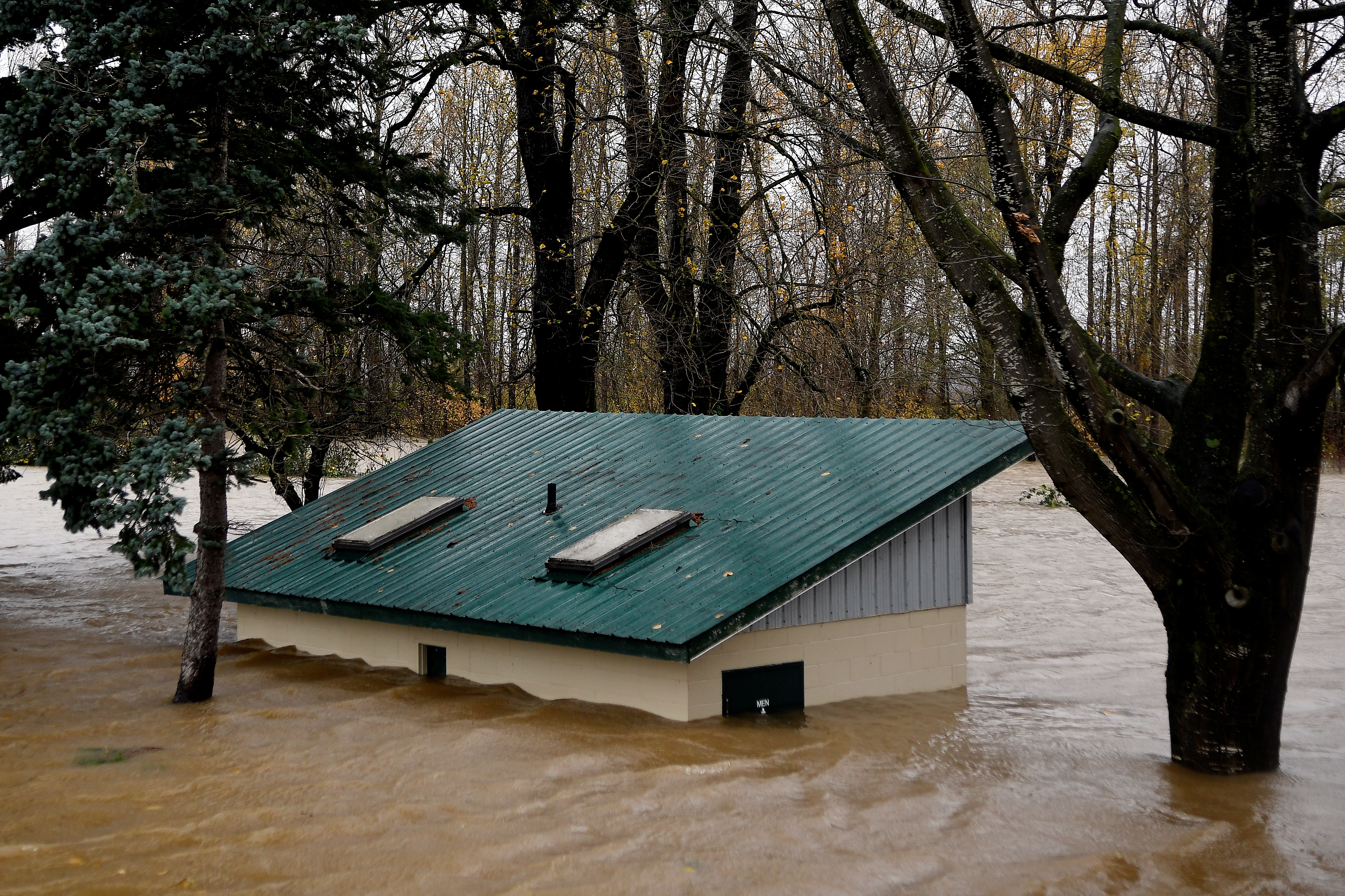 A restrooms building in Hougen Park is seen submerged after rainstorms lashed the western Canadian province of British Columbia, triggering landslides and floods, shutting highways, in Abbotsford, British Columbia, Canada November 15, 2021. REUTERS/Jennifer Gauthier
