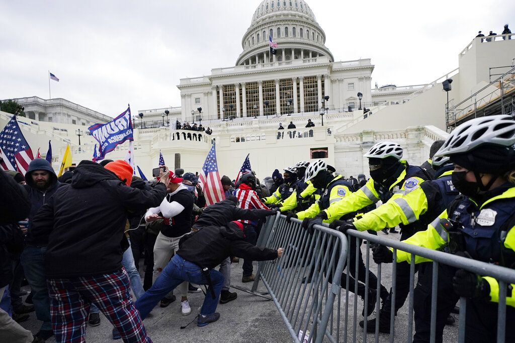 Supporters of Donald Trump riot at the US Capitol on January 6, 2021.
