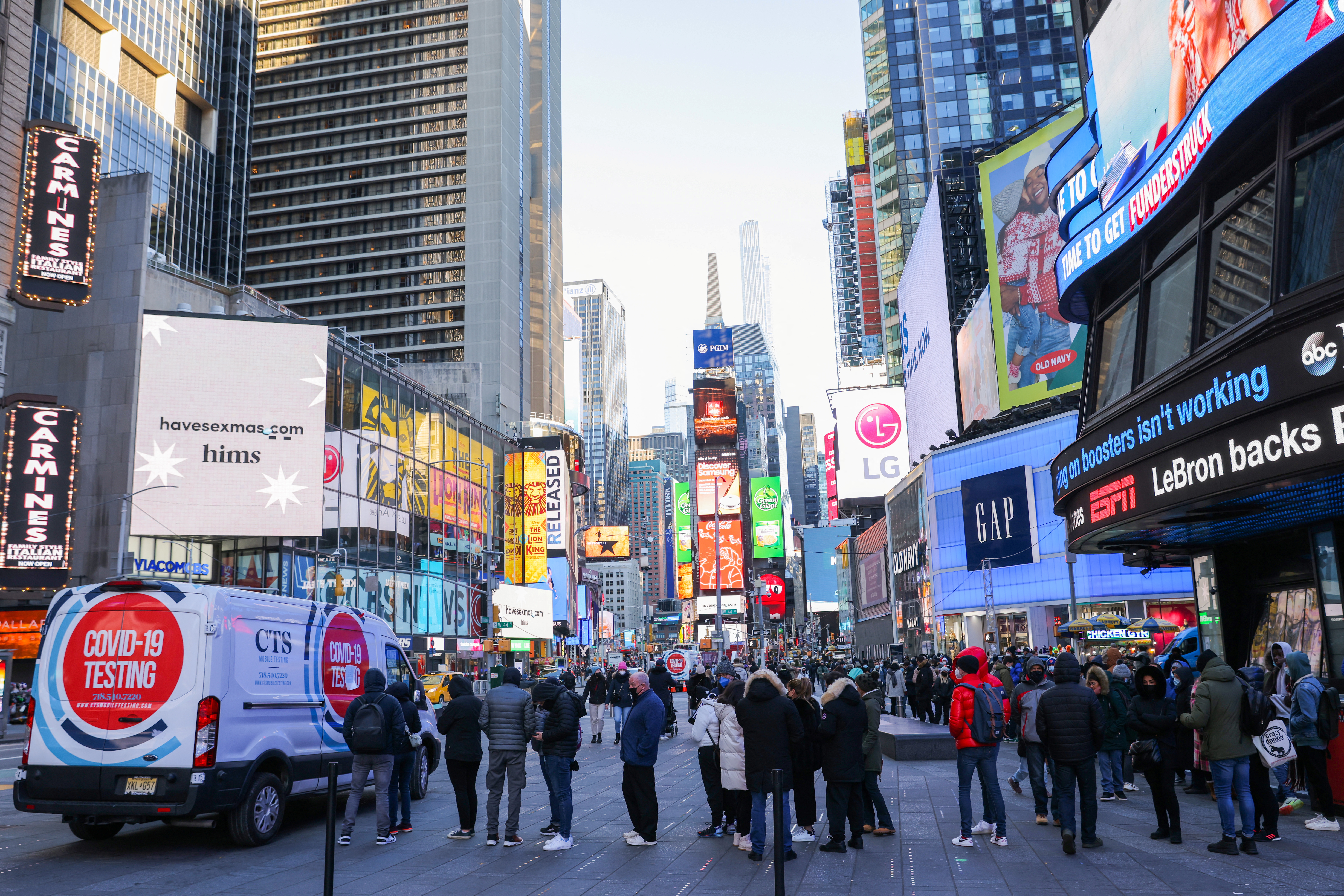 People queue for a COVID-19 test in Times Square New York