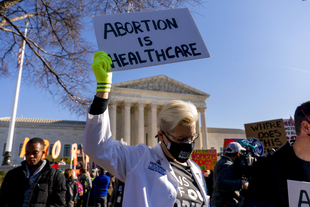 A woman protests for abortion rights in Washington, DC