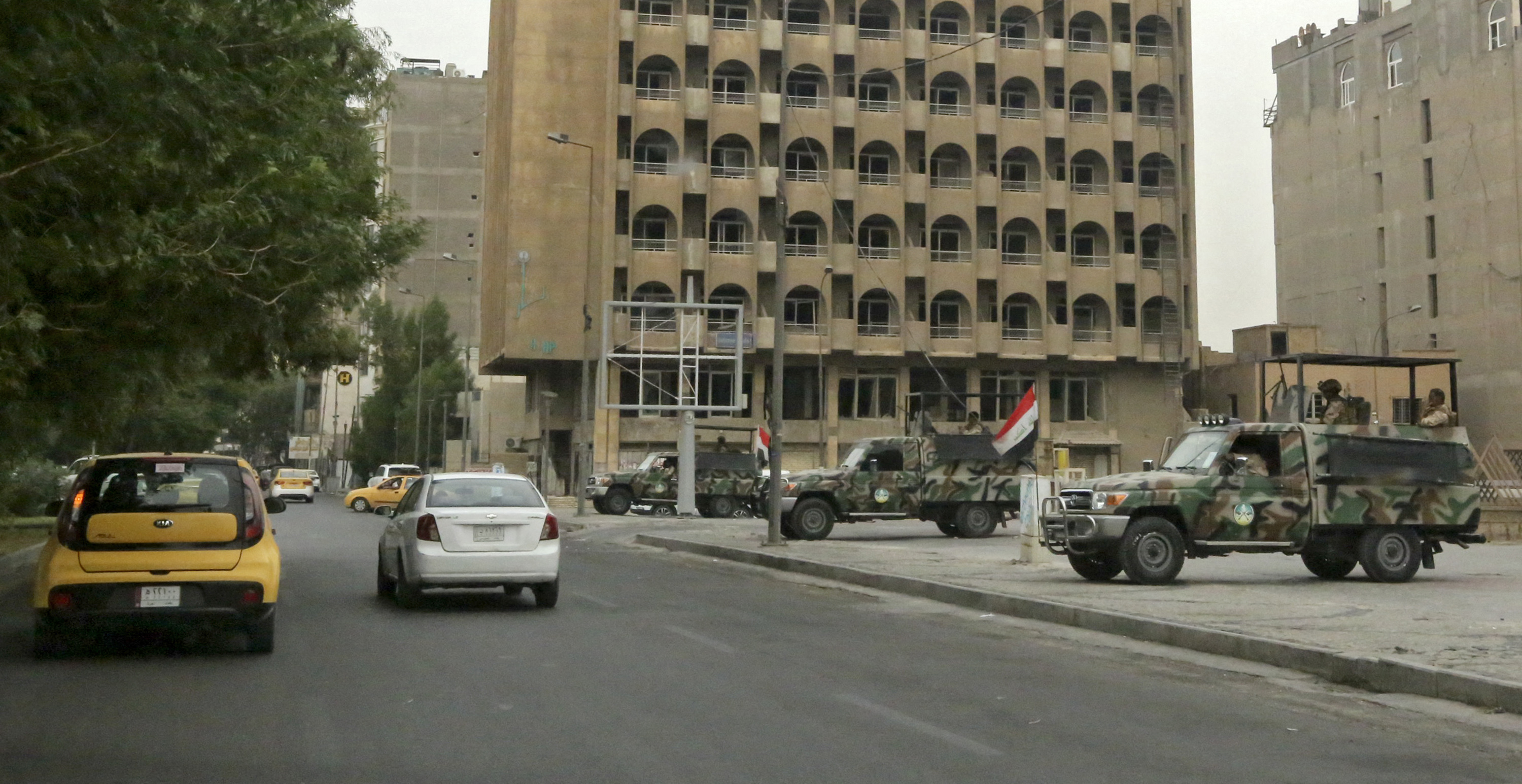 Iraqi security forces stand guard near Baghdad's high-security Green Zone