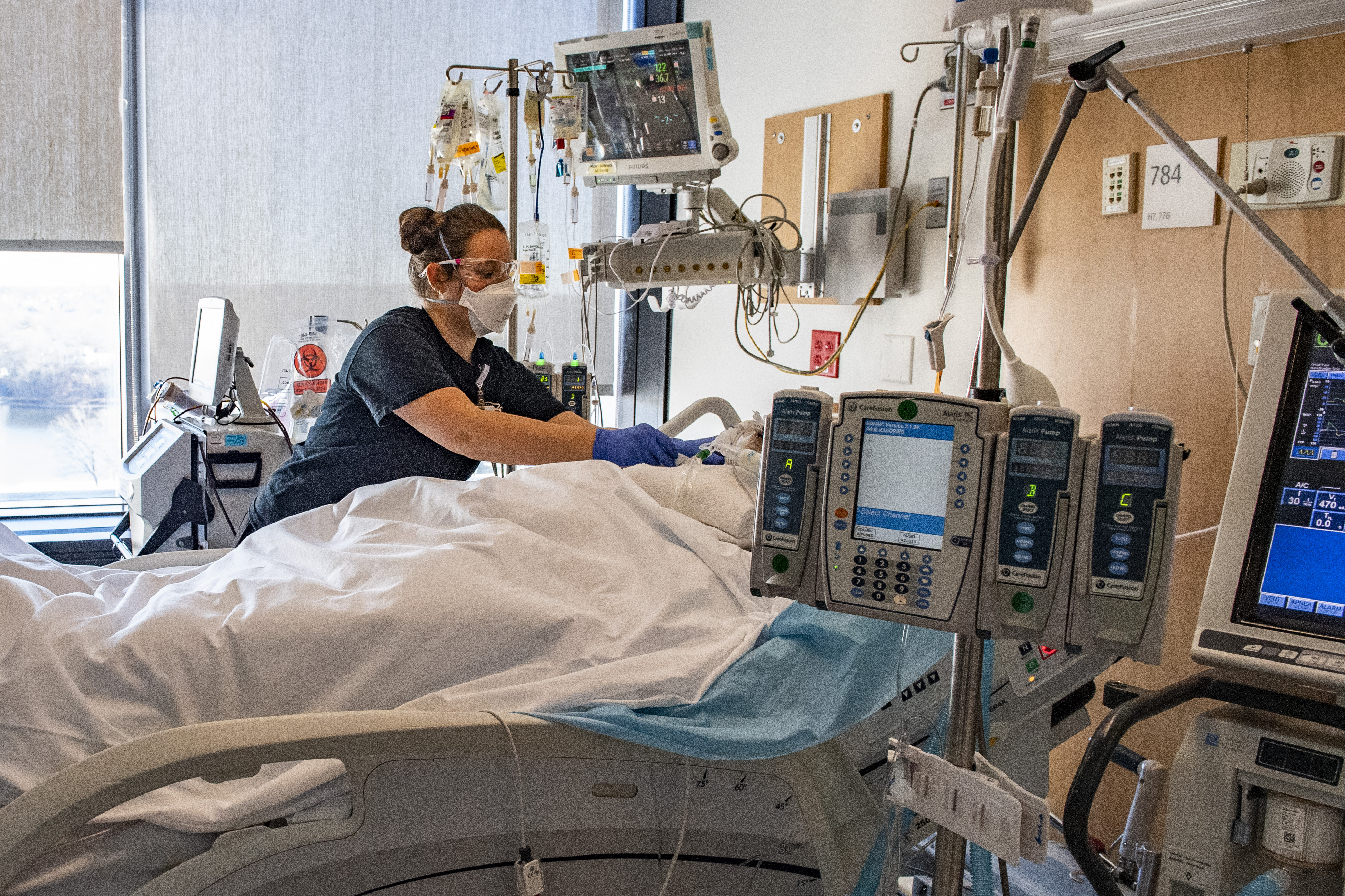 A medical worker treats a non Covid-19 patient at Memorial Medical Center Massachusetts