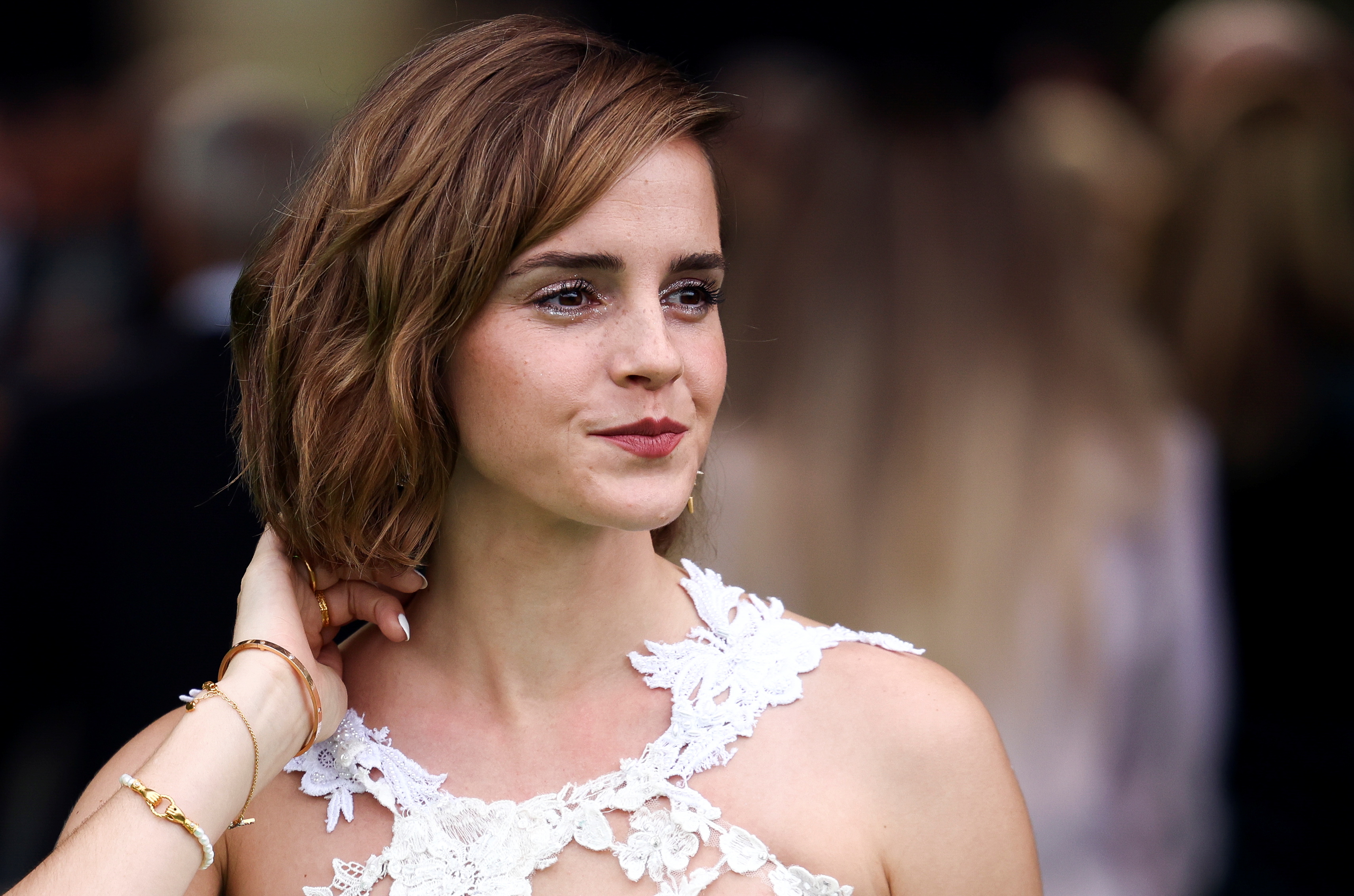 Actress Emma Watson poses in London.