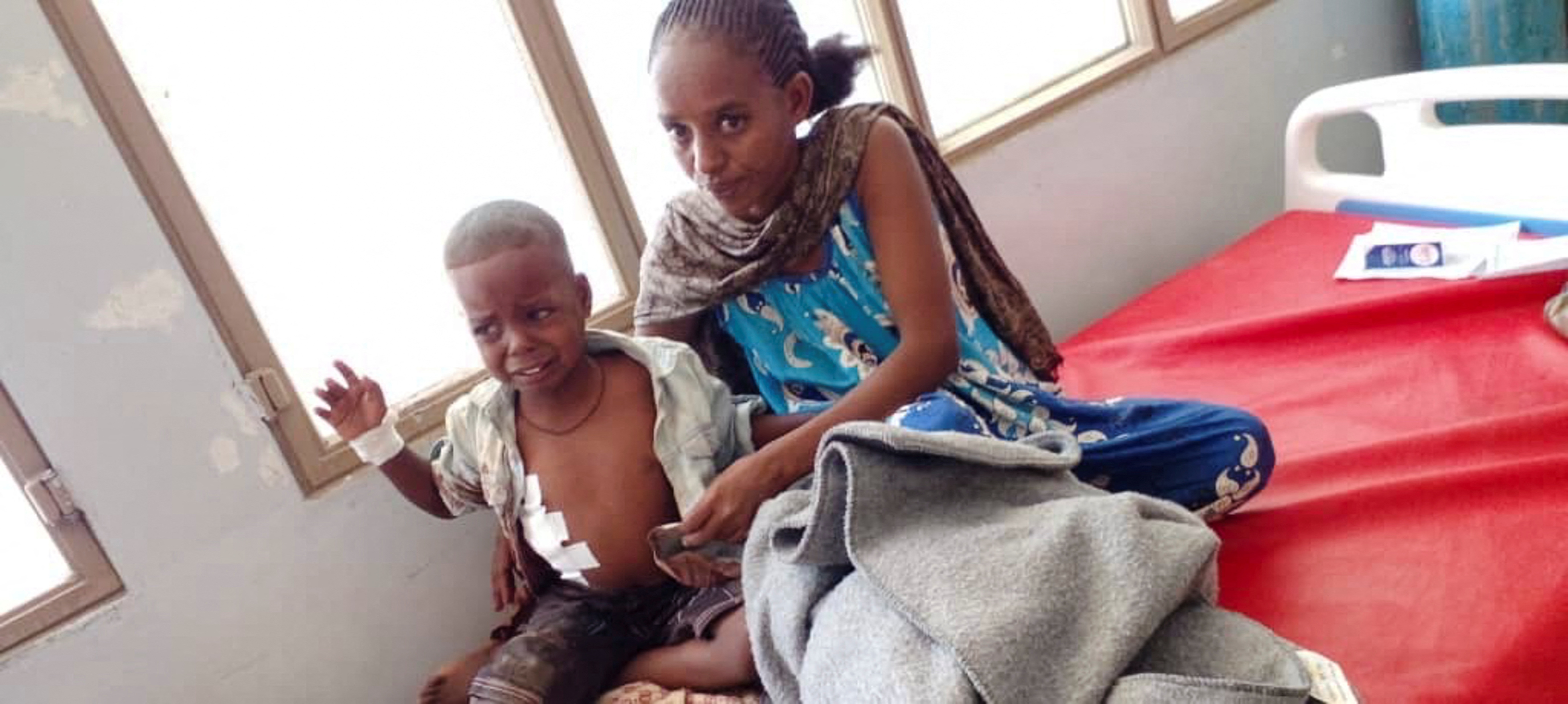 Survivors of an air strike by Ethiopian government forces at a hospital.