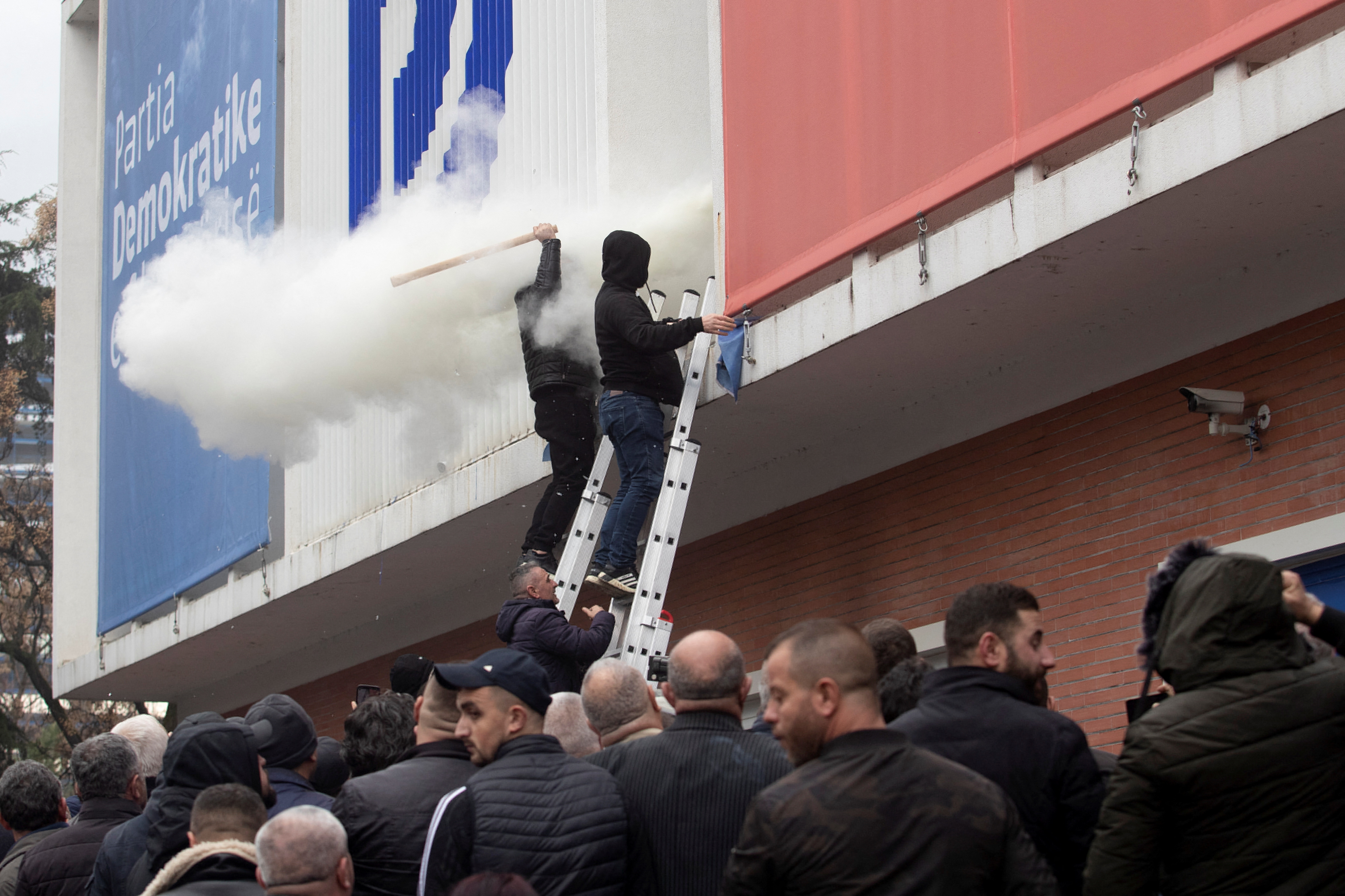 Protesters attack the headquarters of the Democratic Party in Tirana
