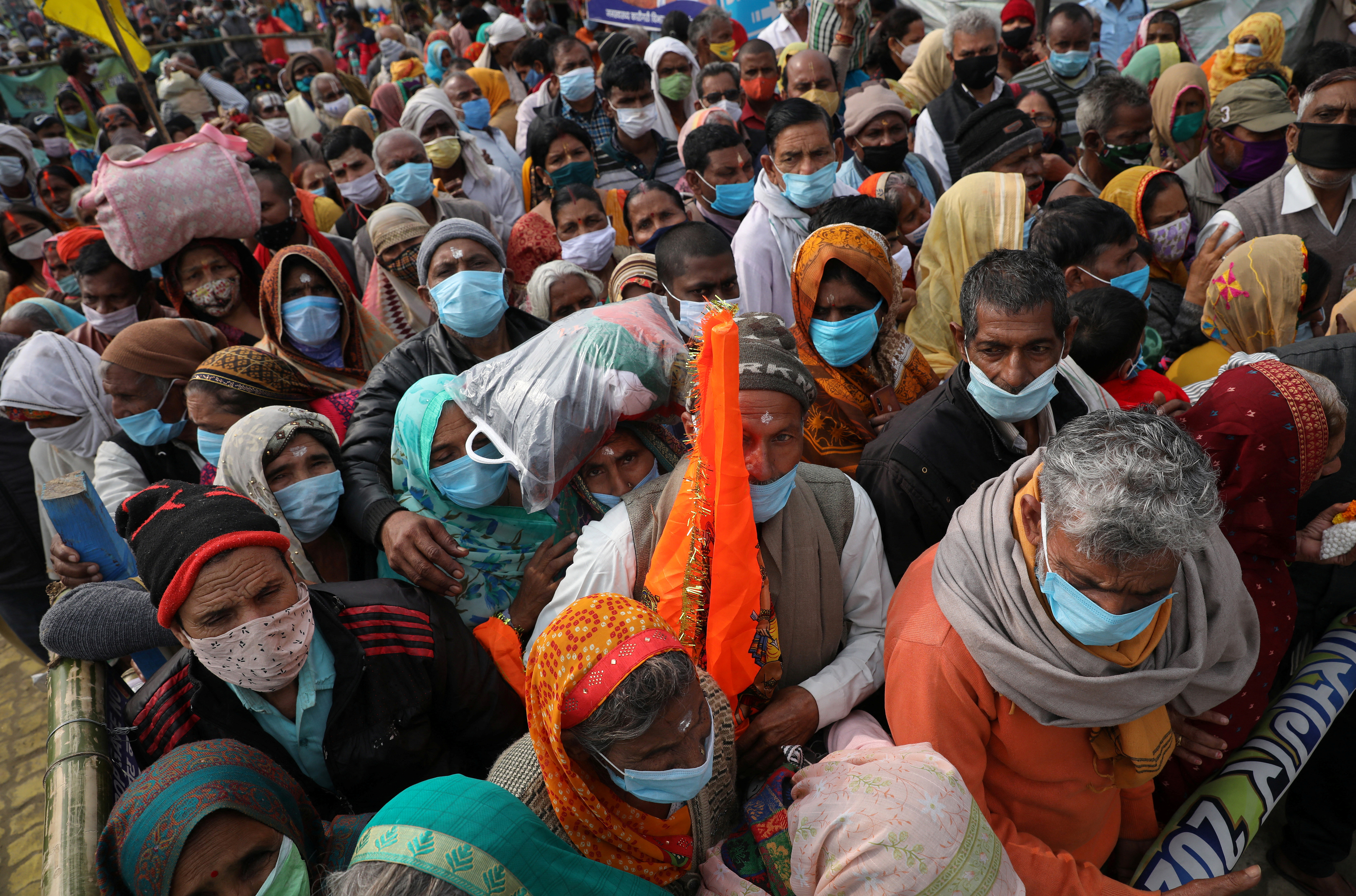 Hindu pilgrims arrive at the confluence of the river Ganges and the Bay of Bengal