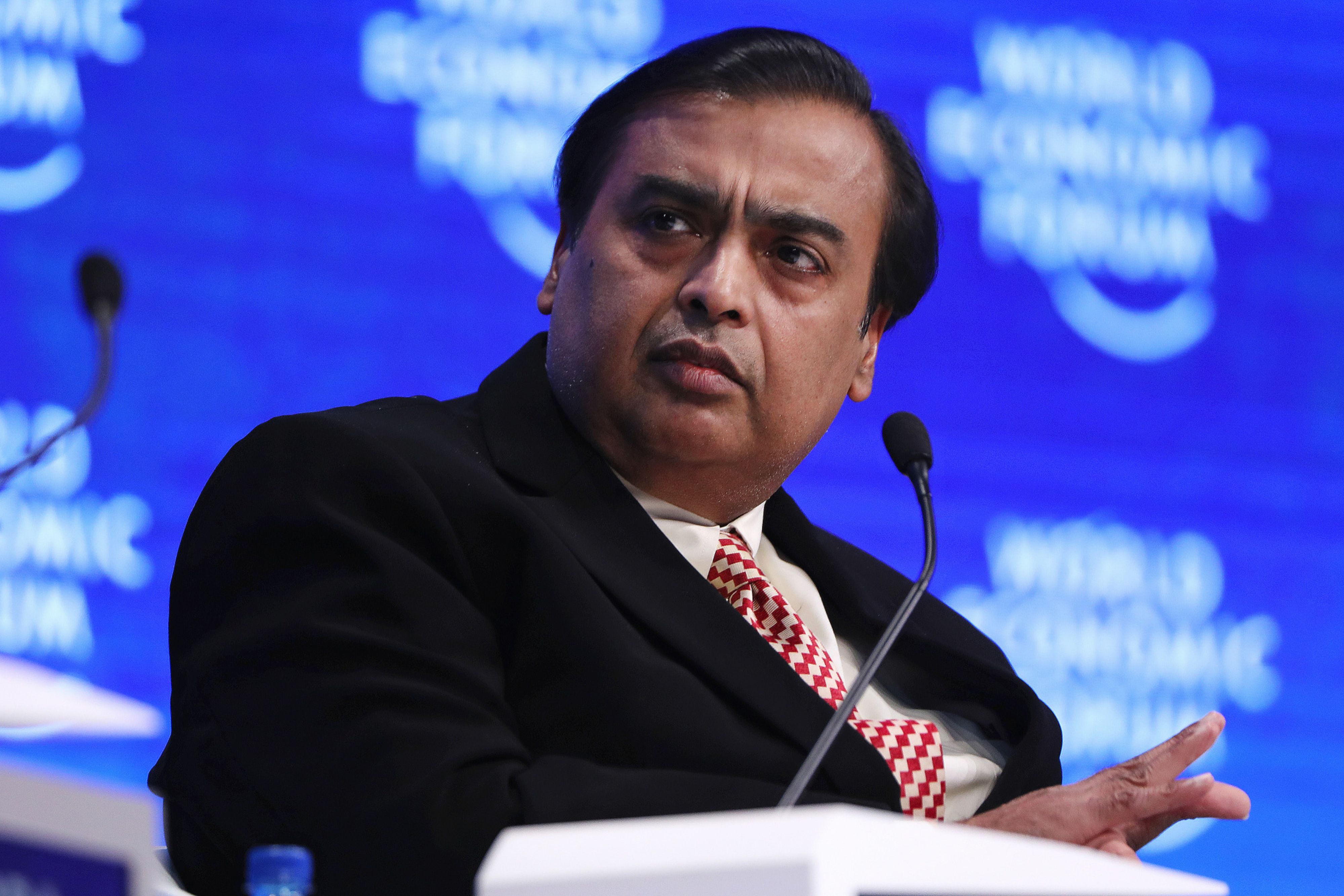 Mukesh Ambani listening at Davos in 2017