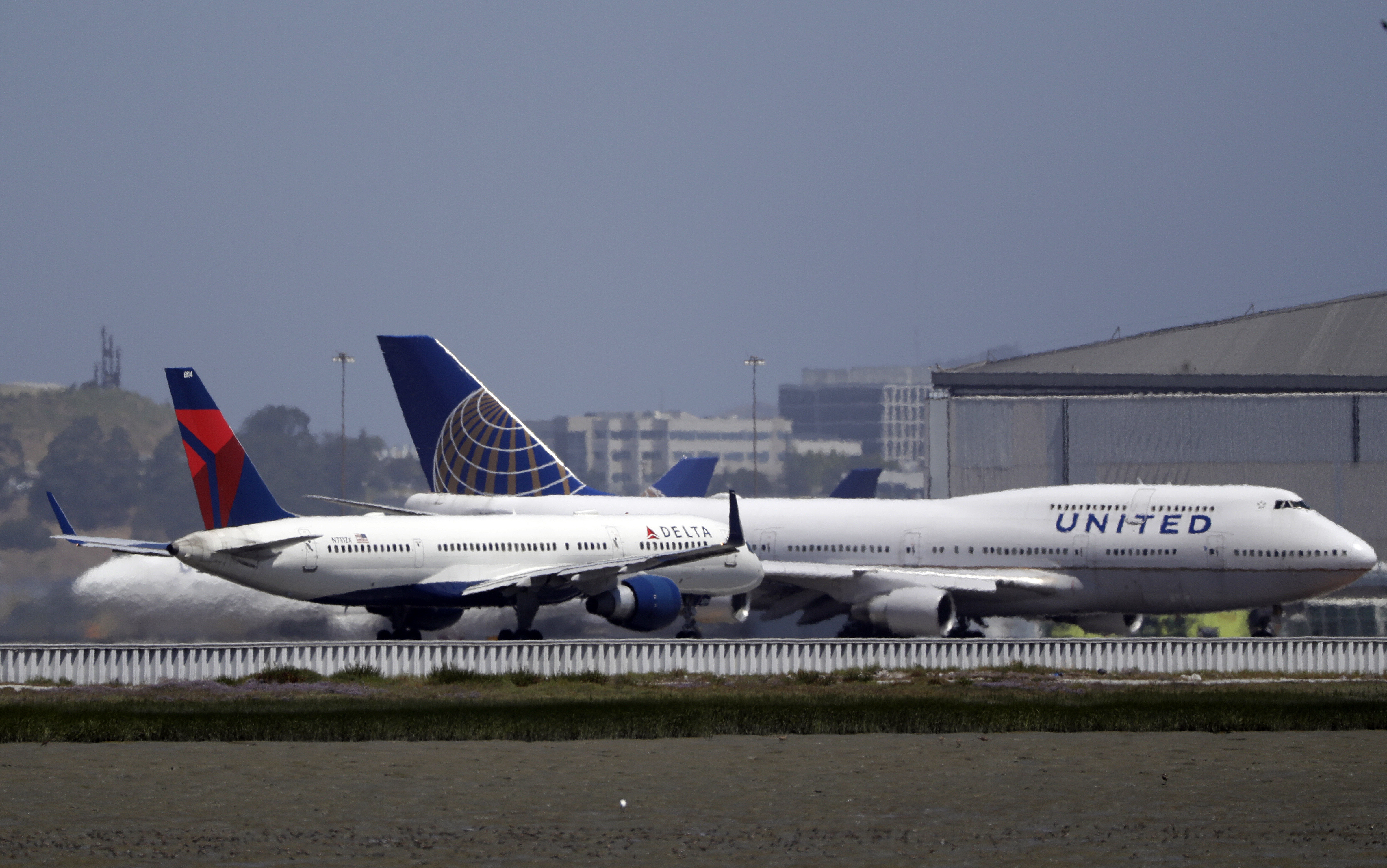 Delta Air Lines jet and a United Airlines plane at San Francisco International Airport in San Francisco