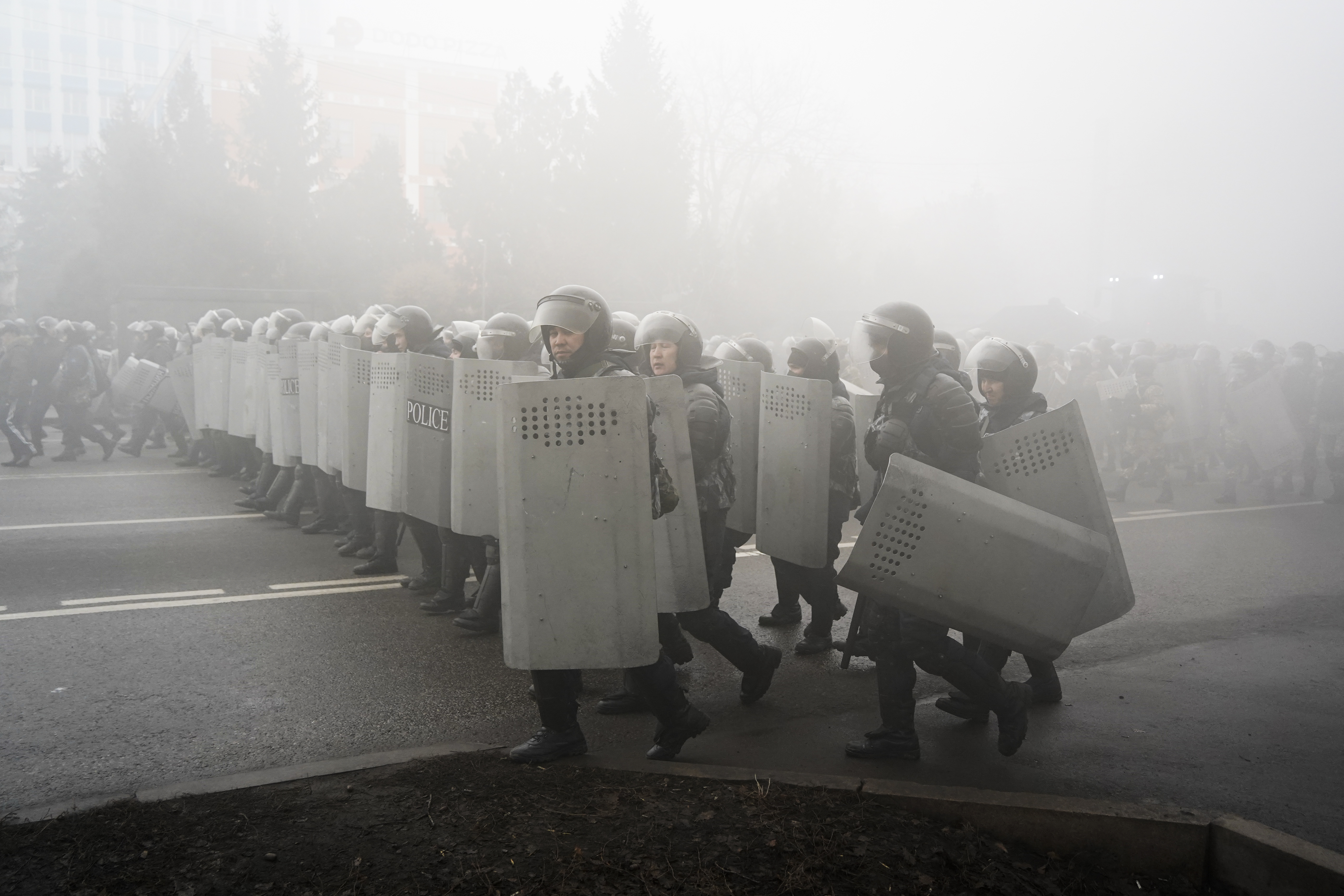 Kazakh law enforcement officers during a protest triggered by fuel price increase in Almaty, Kazakhstan